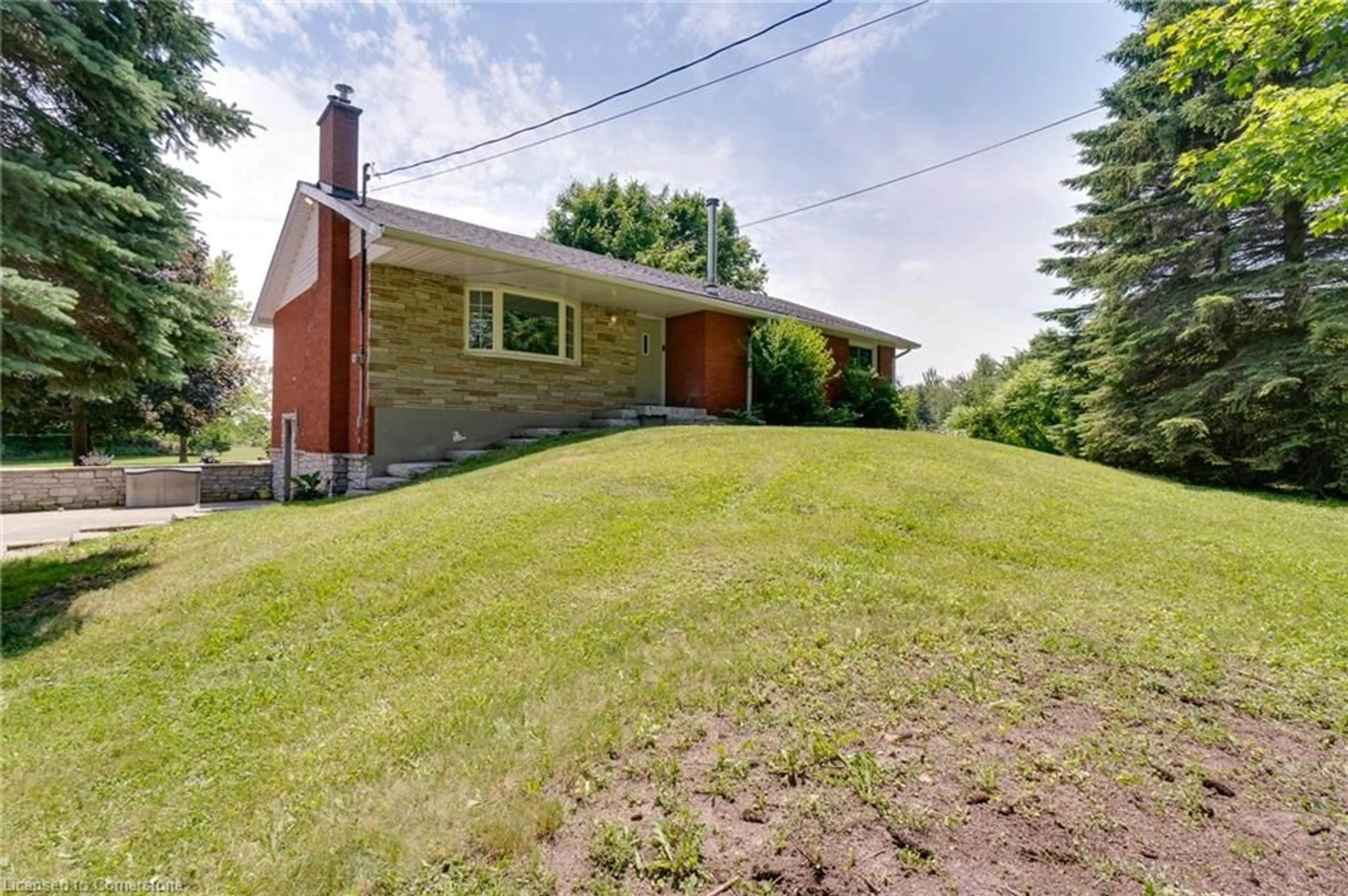 Frontside or backside of a home for 7718 22 Side Road, Halton Hills Ontario L7J 2M1