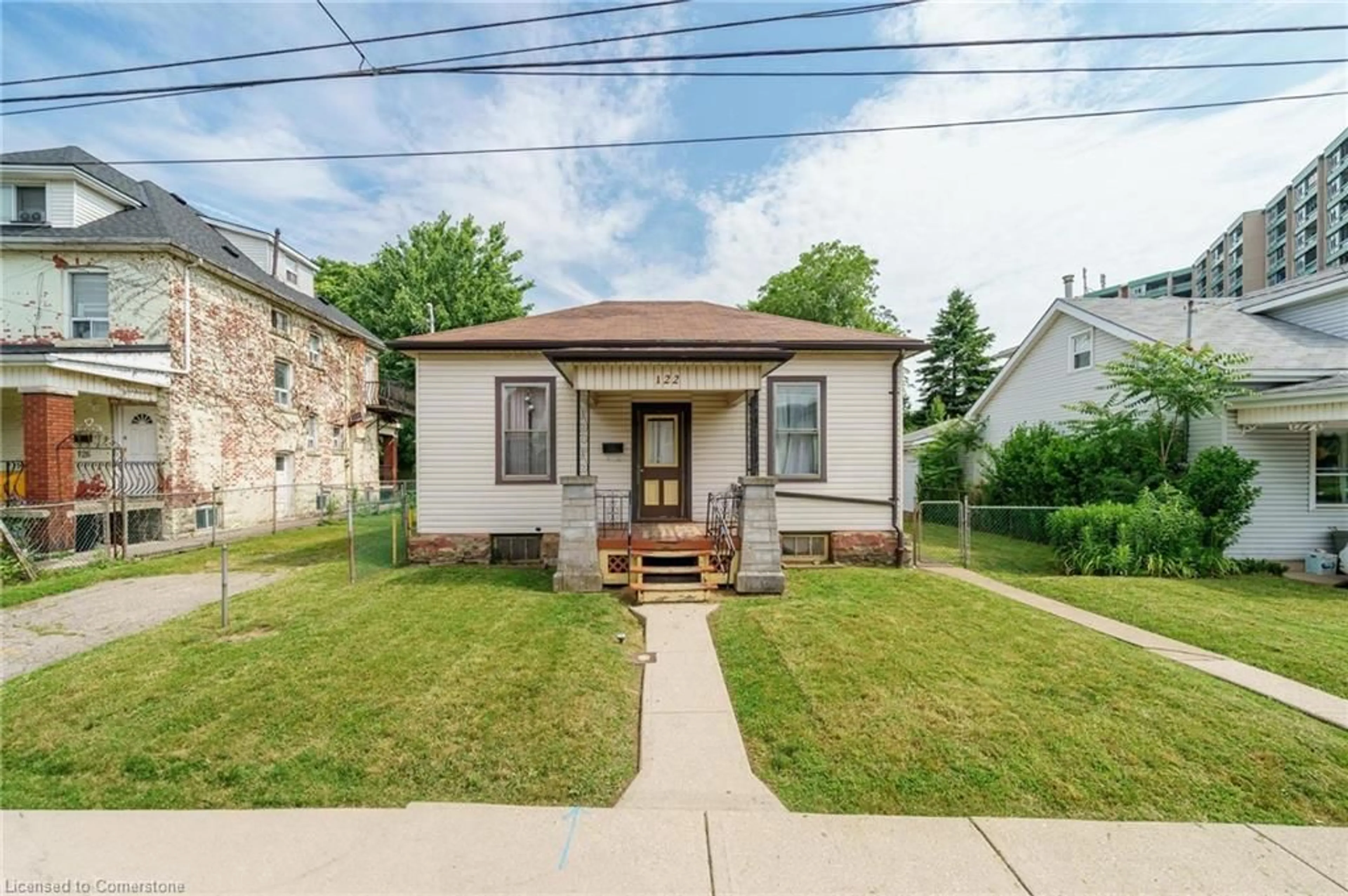 Frontside or backside of a home for 122 Florence St, Hamilton Ontario L8R 1W9