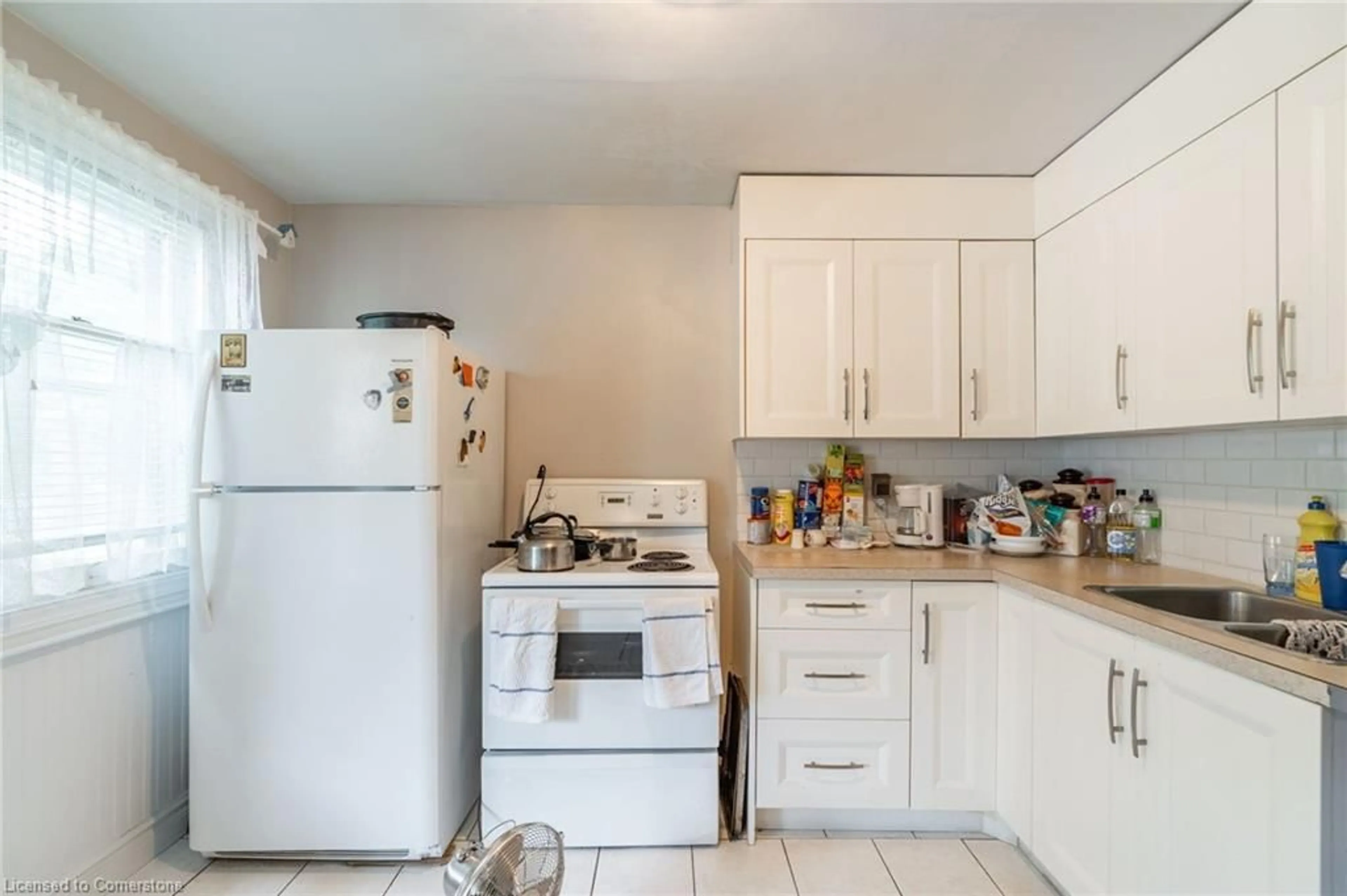 Standard kitchen, wood floors, cottage for 537 Ferguson Ave, Hamilton Ontario L8L 4Z7