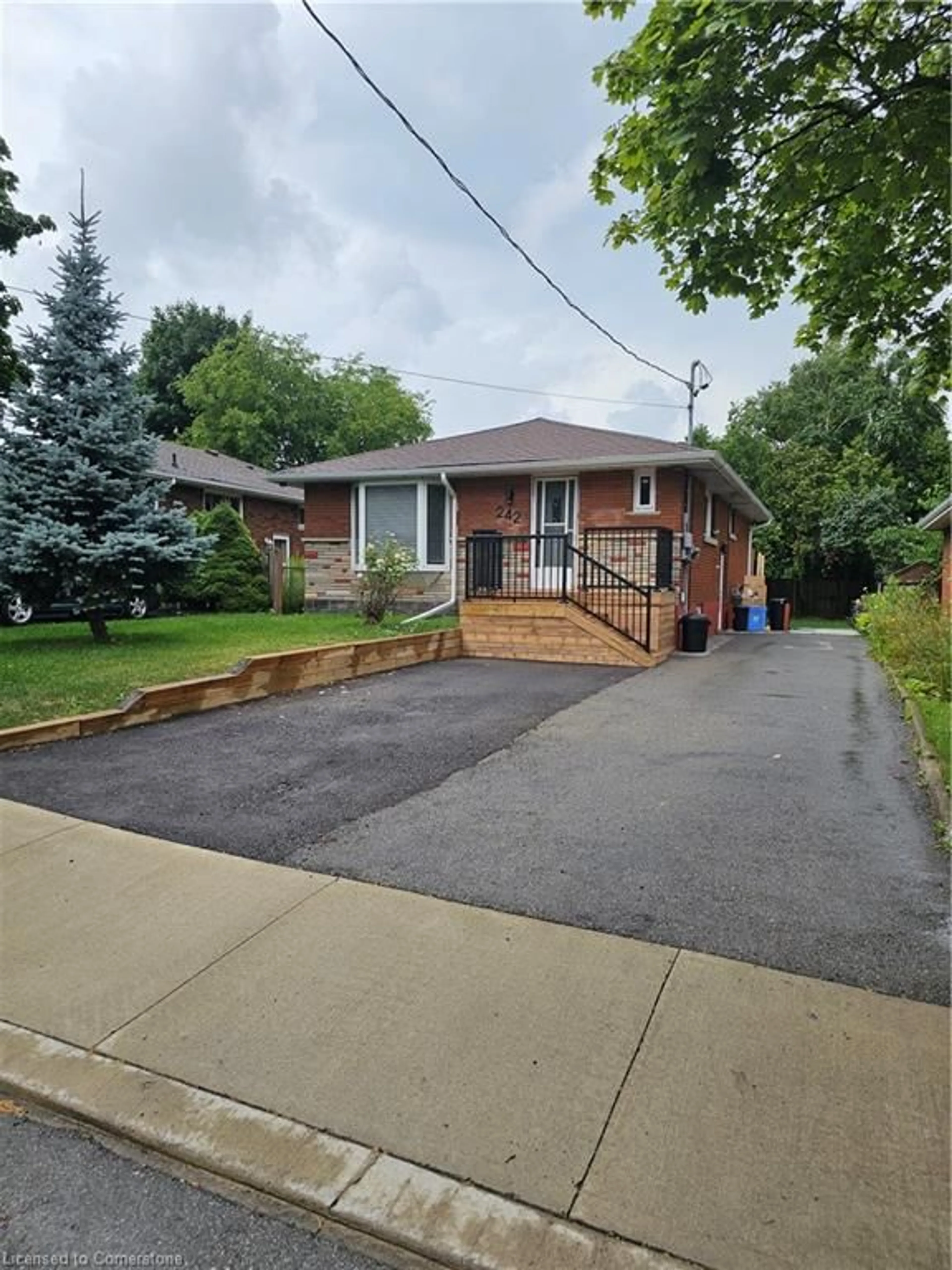 Frontside or backside of a home, the street view for 242 West 18th St, Hamilton Ontario L9C 4G9