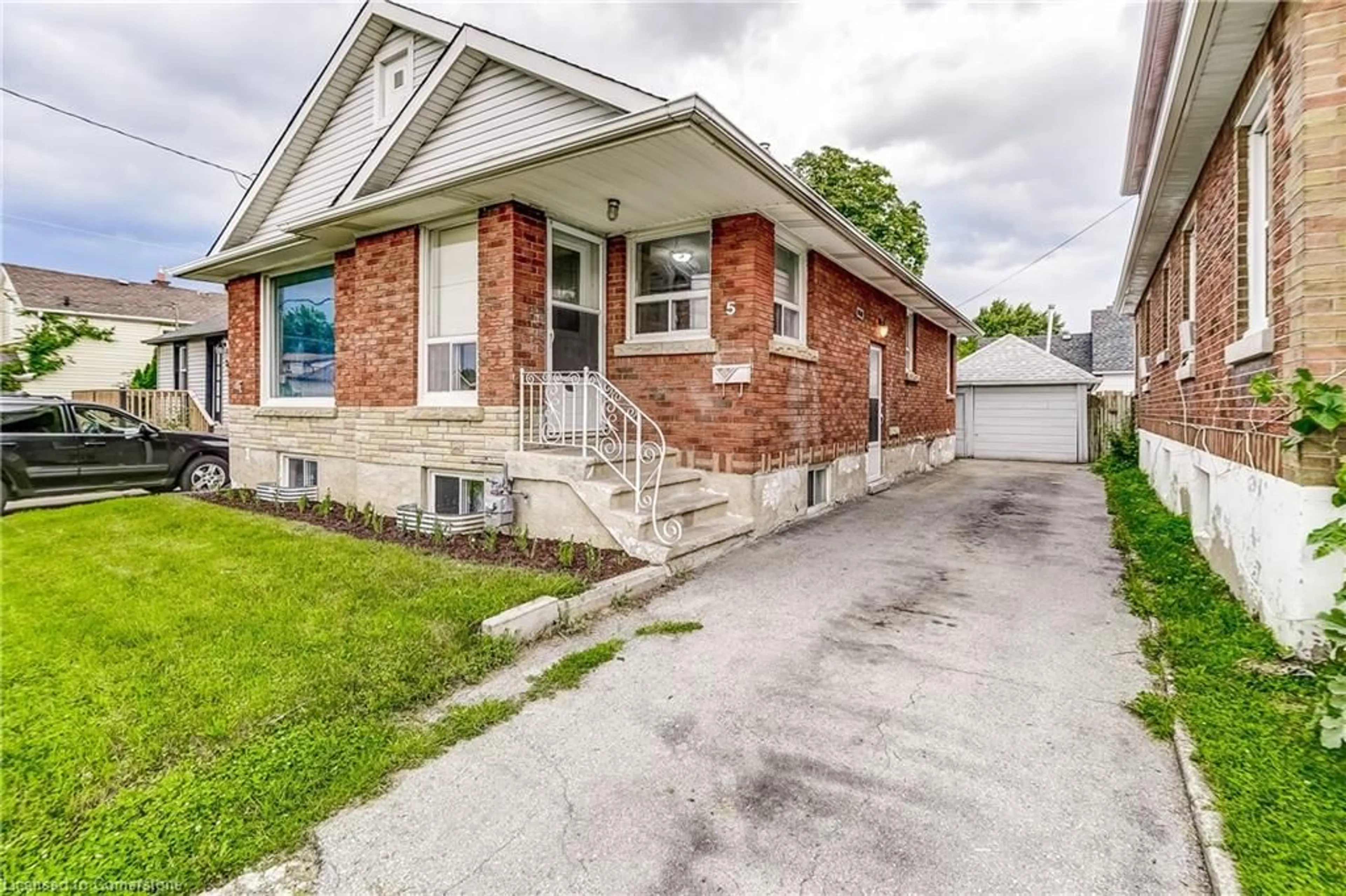 Frontside or backside of a home, the street view for 5 Bartlett St, St. Catharines Ontario L2M 5K5