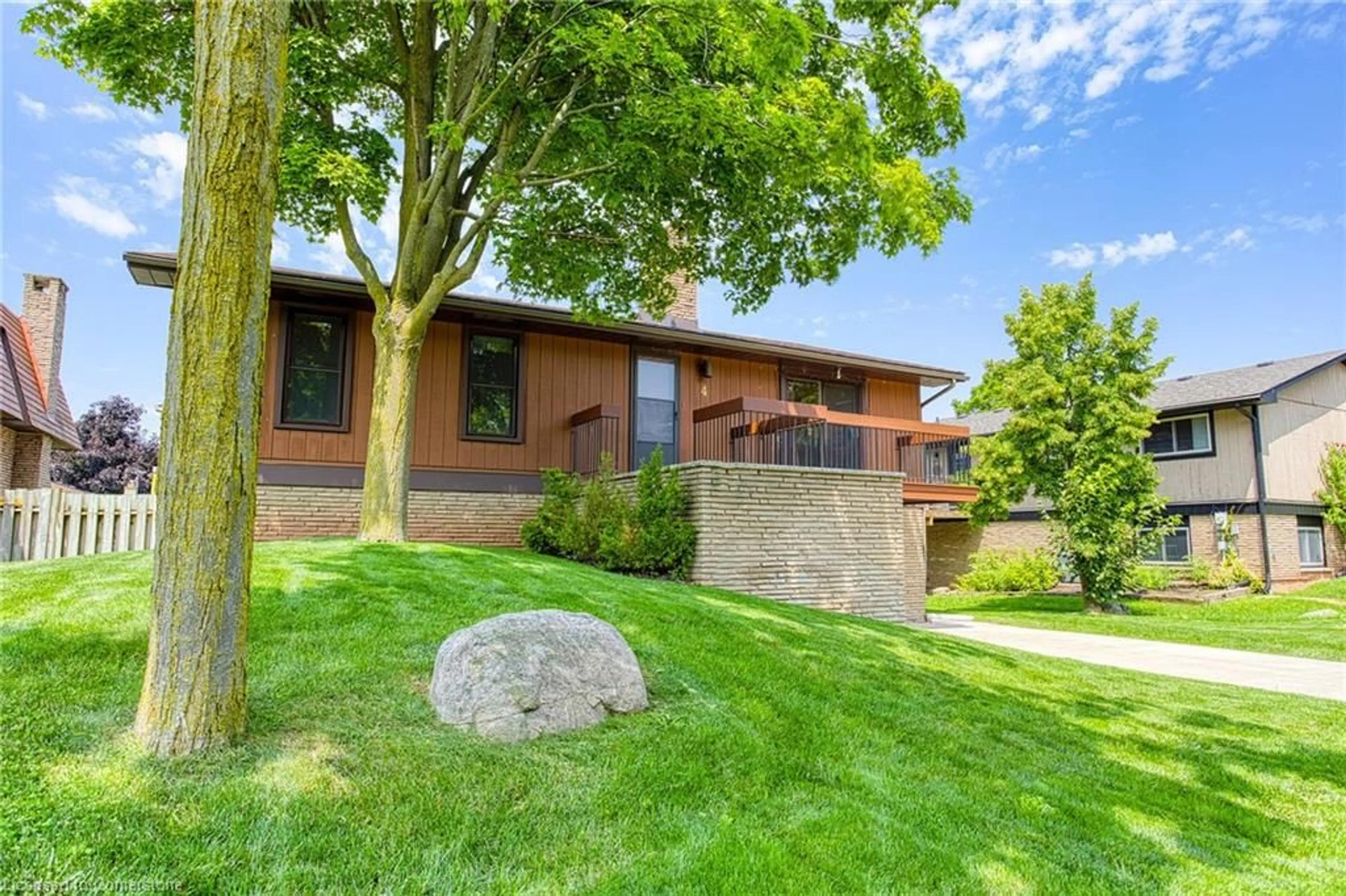 A pic from exterior of the house or condo, the fenced backyard for 4 Cedar Glen&, Grimsby Ontario L3M 4K2