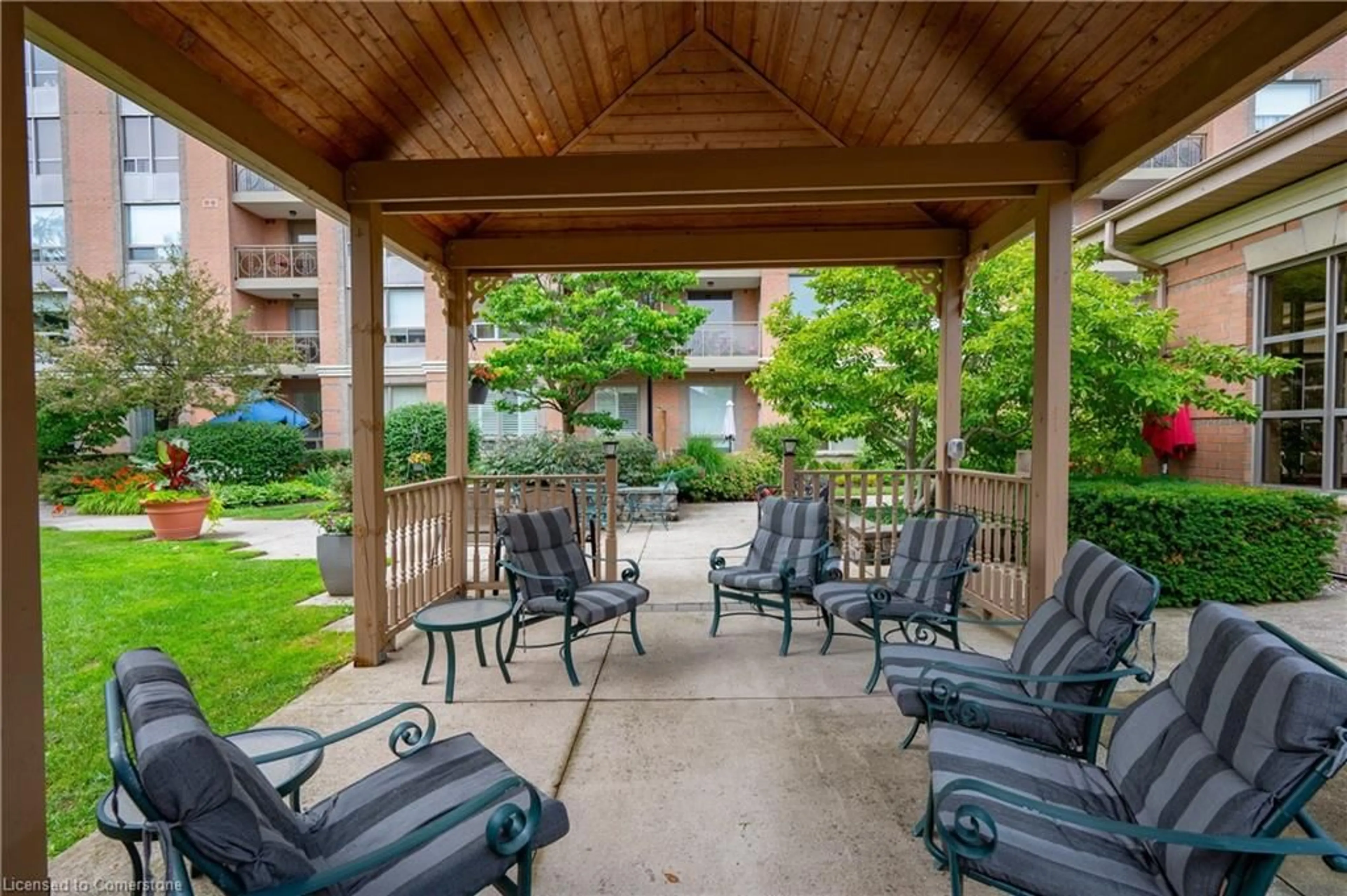 Patio, the fenced backyard for 100 Burloak Dr #1214, Burlington Ontario L7L 6P6