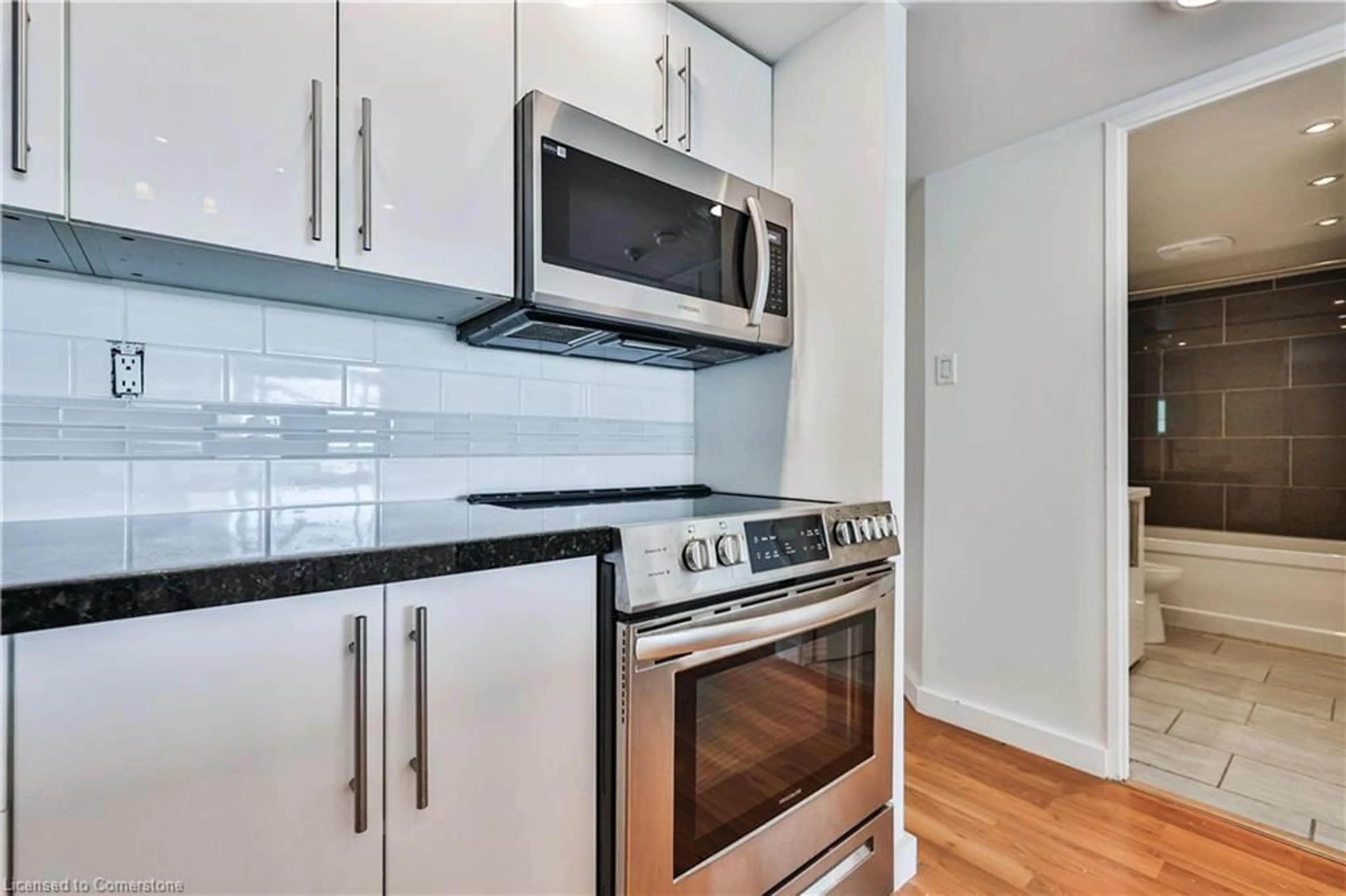 Standard kitchen, wood floors for 725 King St #901, Toronto Ontario M5V 2W9