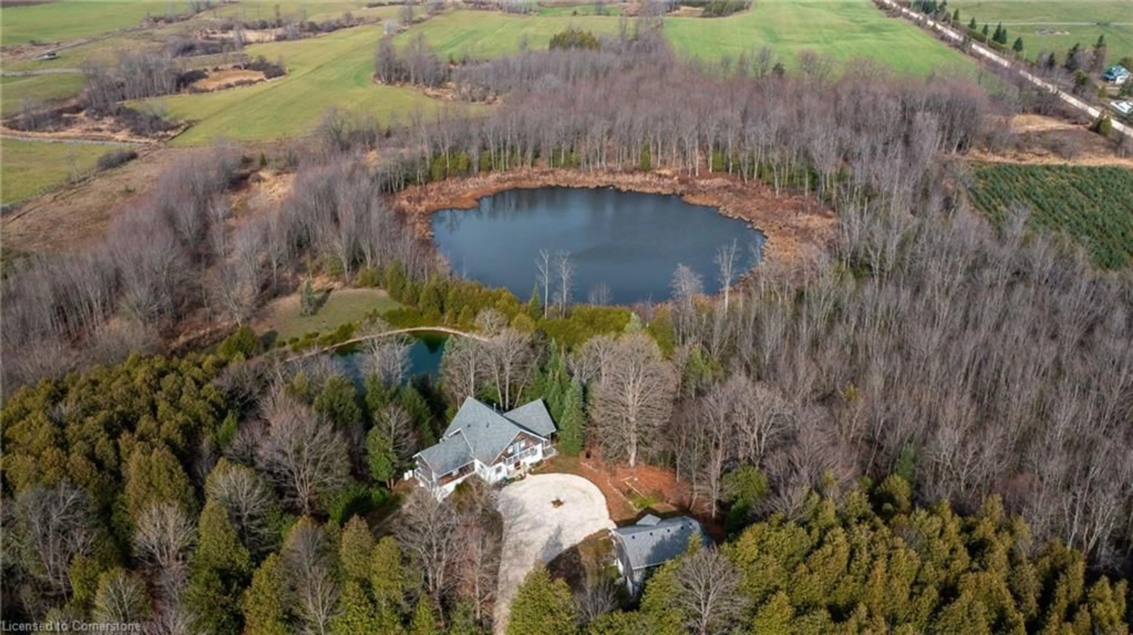 A pic from outside/outdoor area/front of a property/back of a property/a pic from drone, water/lake/river/ocean view for 304399 South Line, Priceville Ontario N0C 1K0
