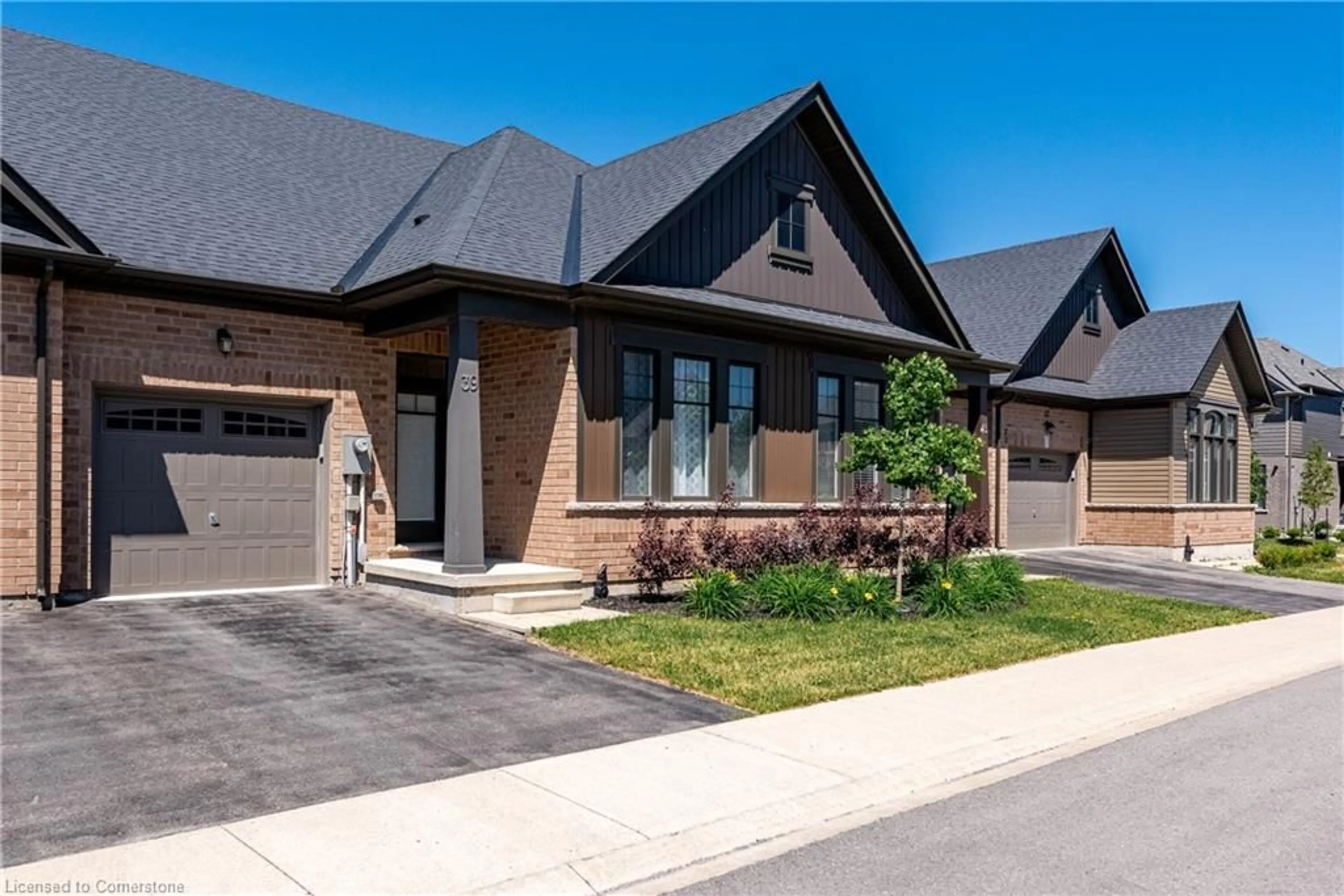 Home with brick exterior material for 39 Cosmopolitan Common, St. Catharines Ontario L2M 0A6