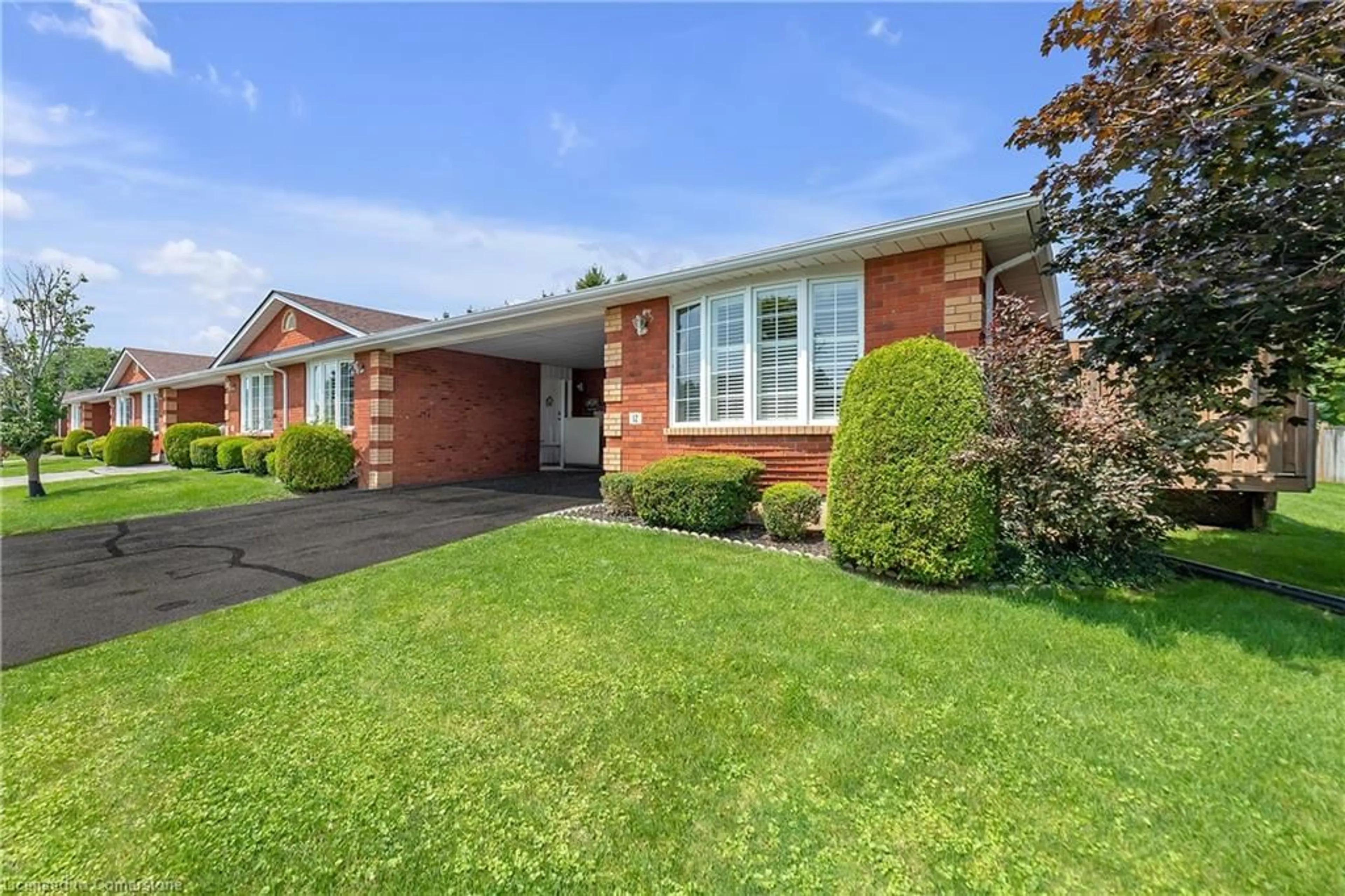 Home with brick exterior material for 20 Courtland Dr #12, Brantford Ontario N3R 7Y2