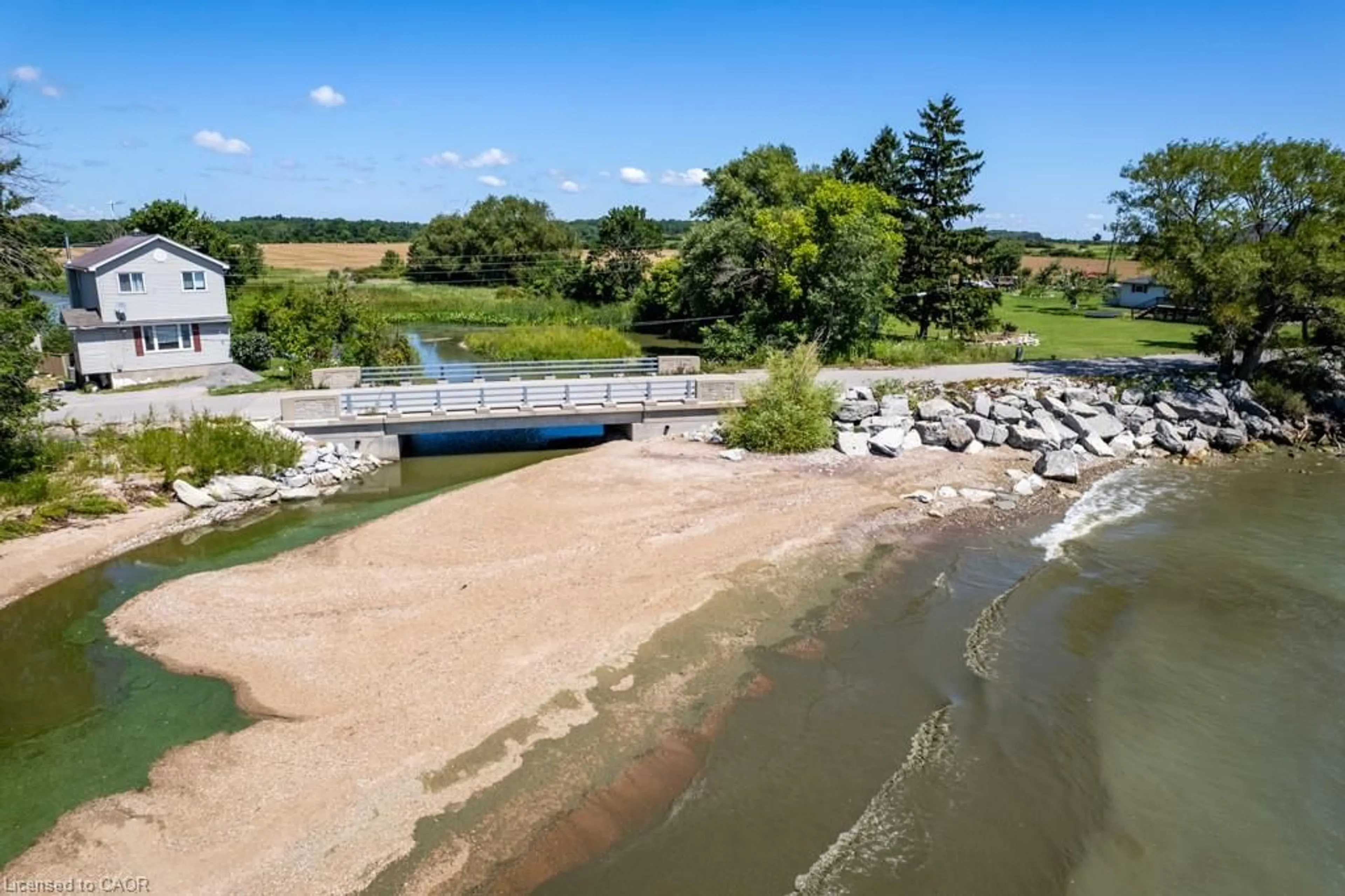 A pic from outside/outdoor area/front of a property/back of a property/a pic from drone, water/lake/river/ocean view for 1407 Lakeshore Rd, Selkirk Ontario N0A 1P0