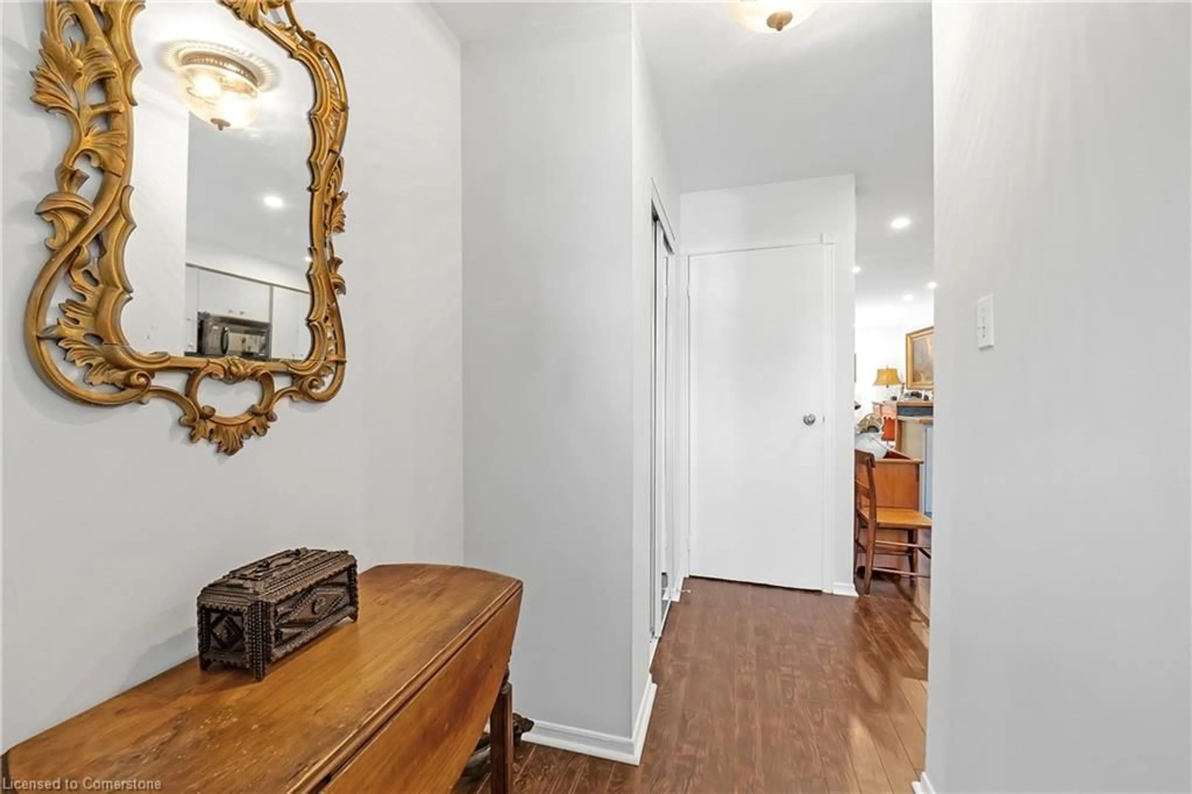 Indoor foyer, wood floors for 23 Macaulay St #3, Hamilton Ontario L8L 1E6