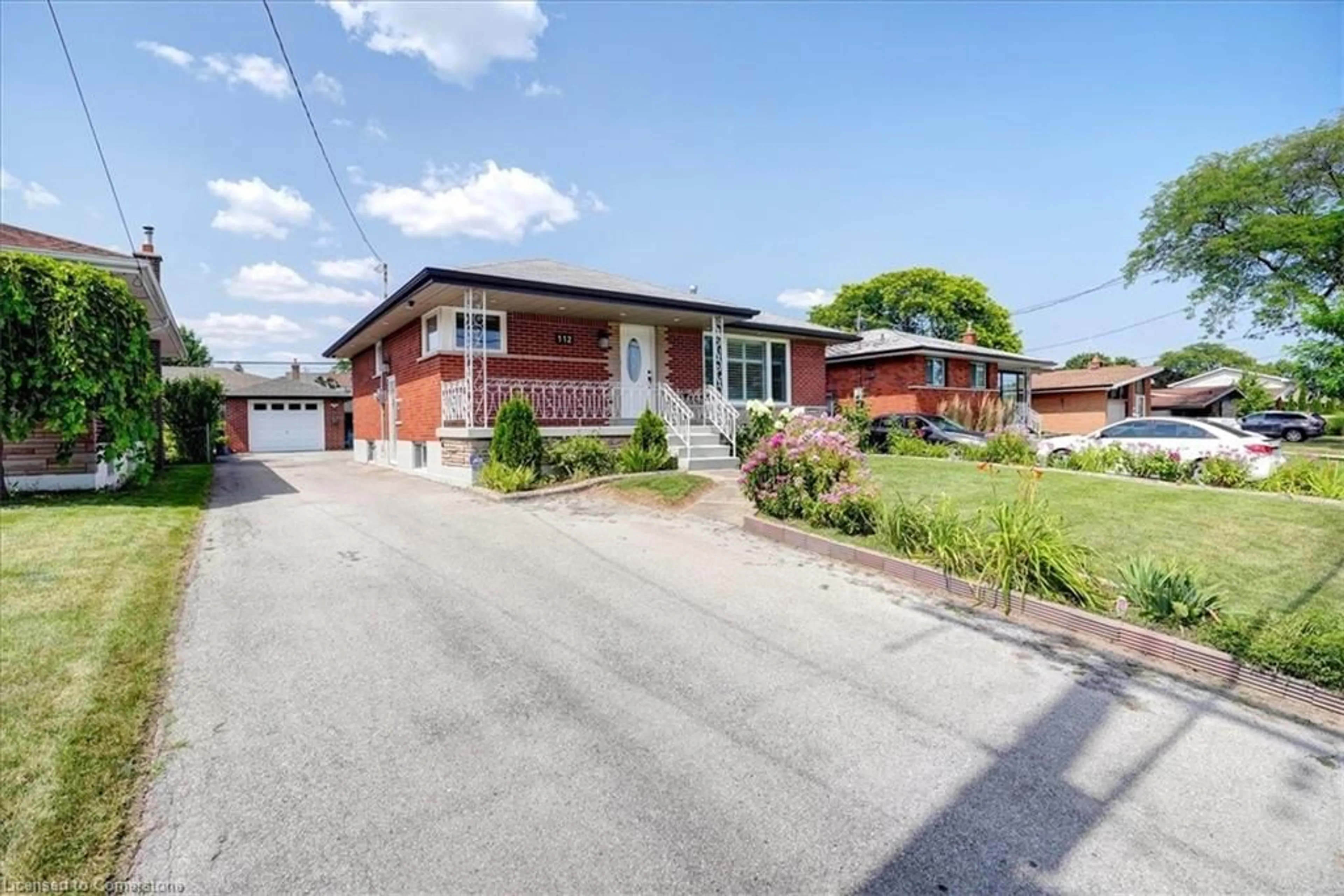 Frontside or backside of a home, the street view for 112 Sunrise Dr, Hamilton Ontario L8K 4C3