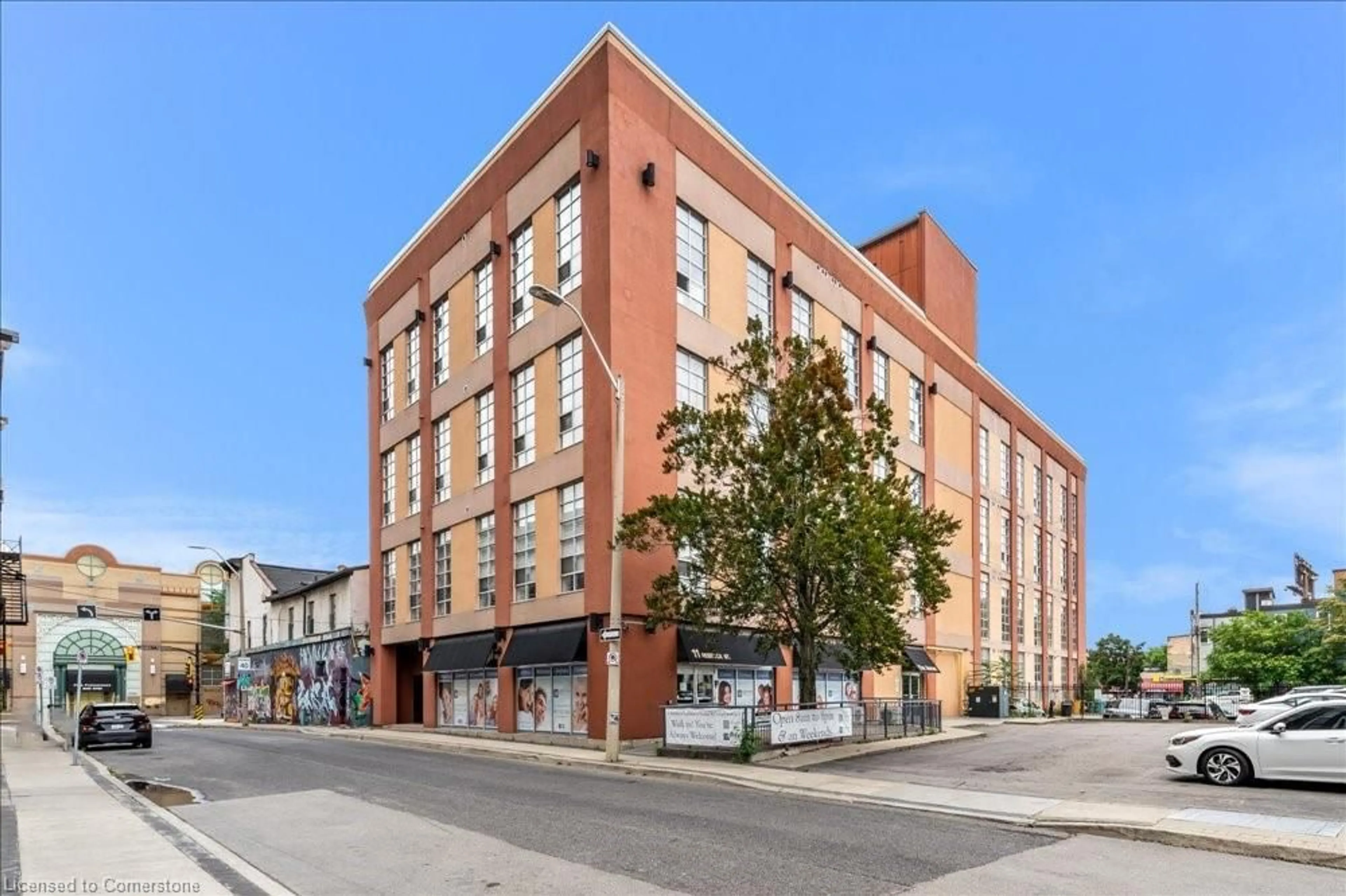 Home with brick exterior material, building for 11 Rebecca St #403, Hamilton Ontario L8R 3H7