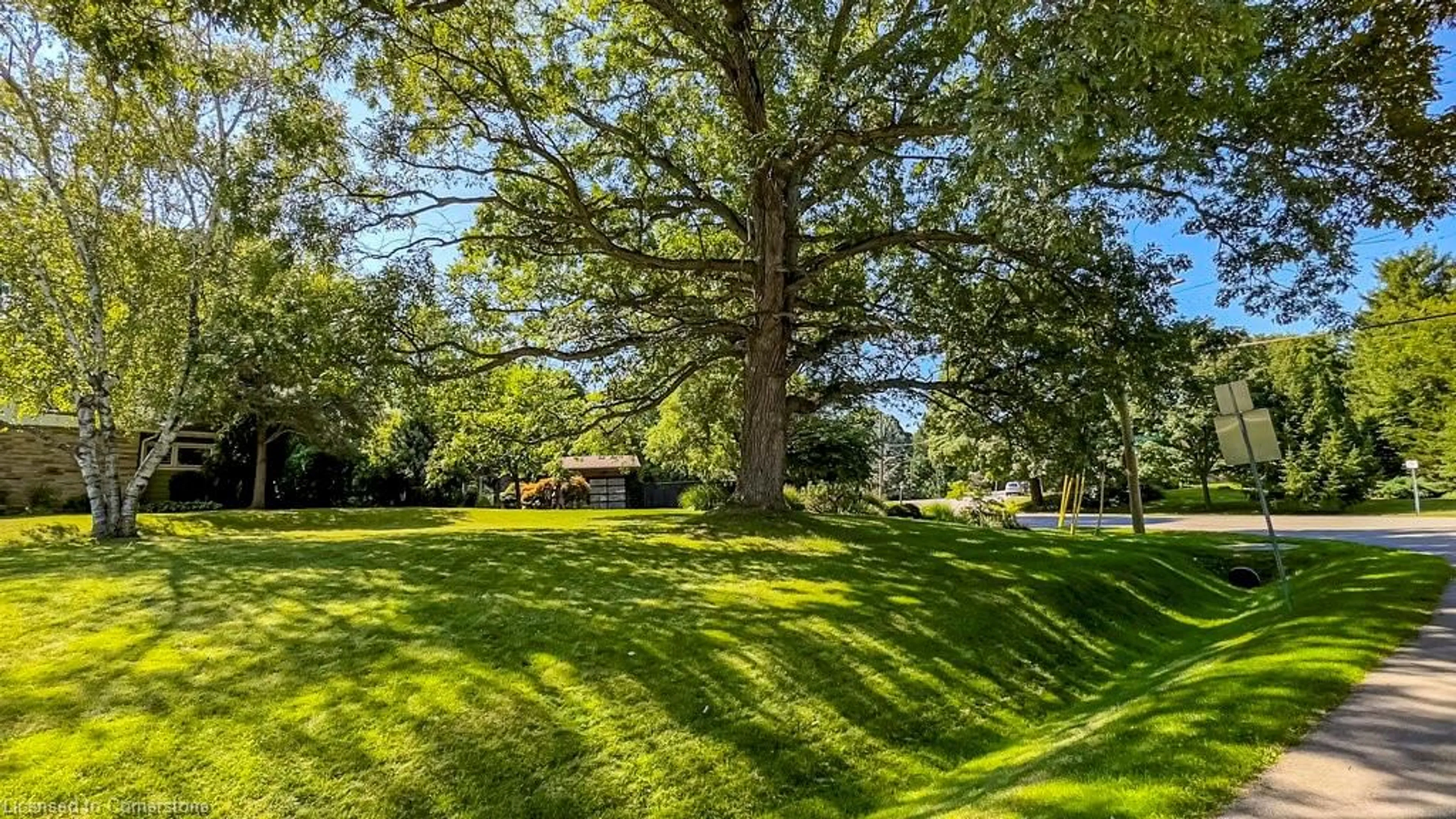 A pic from exterior of the house or condo, the fenced backyard for 858 Montgomery Dr, Ancaster Ontario L9G 3H9