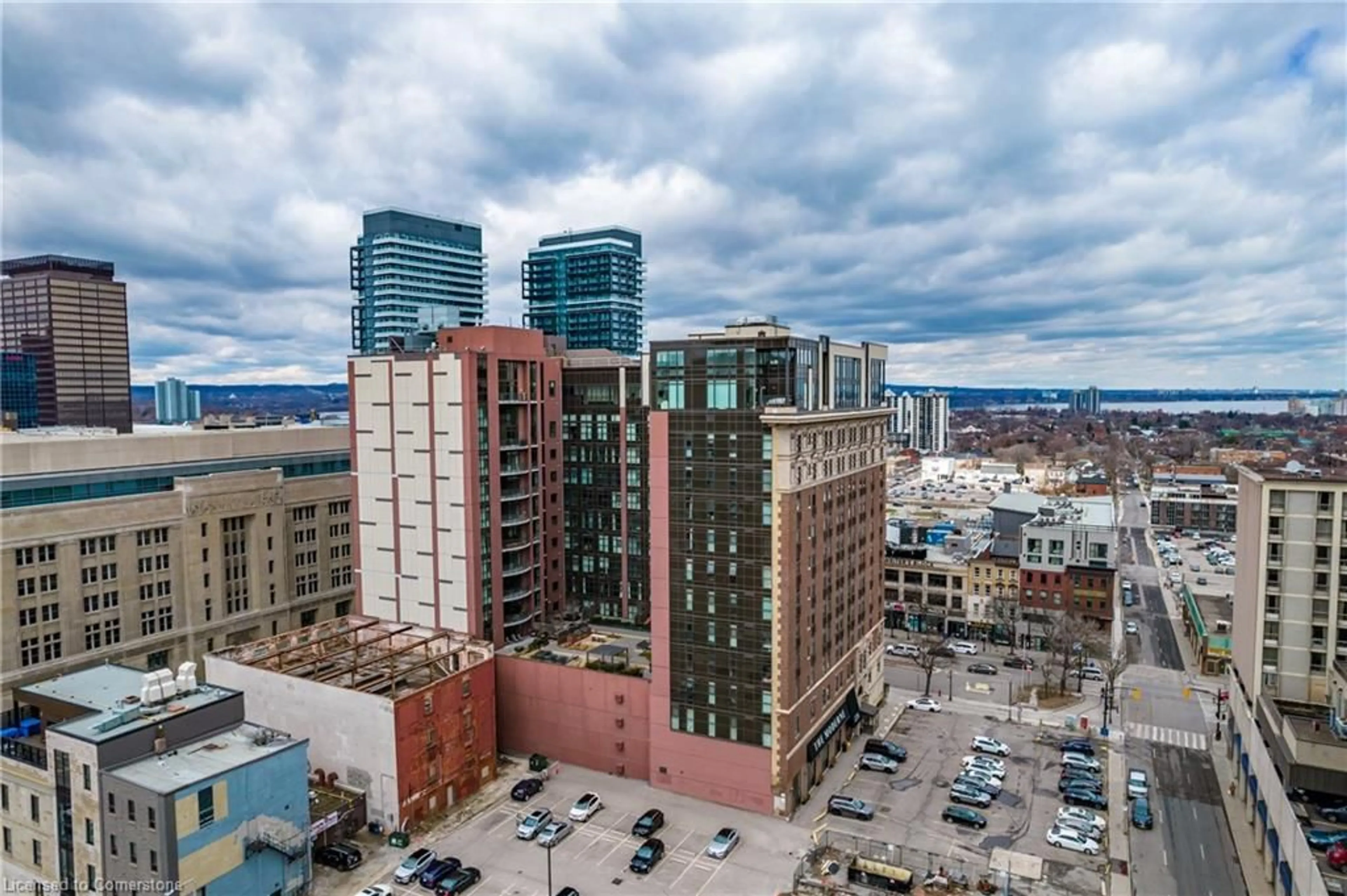 A pic from exterior of the house or condo, the view of city buildings for 112 King St #LPH01, Hamilton Ontario L8N 1A8