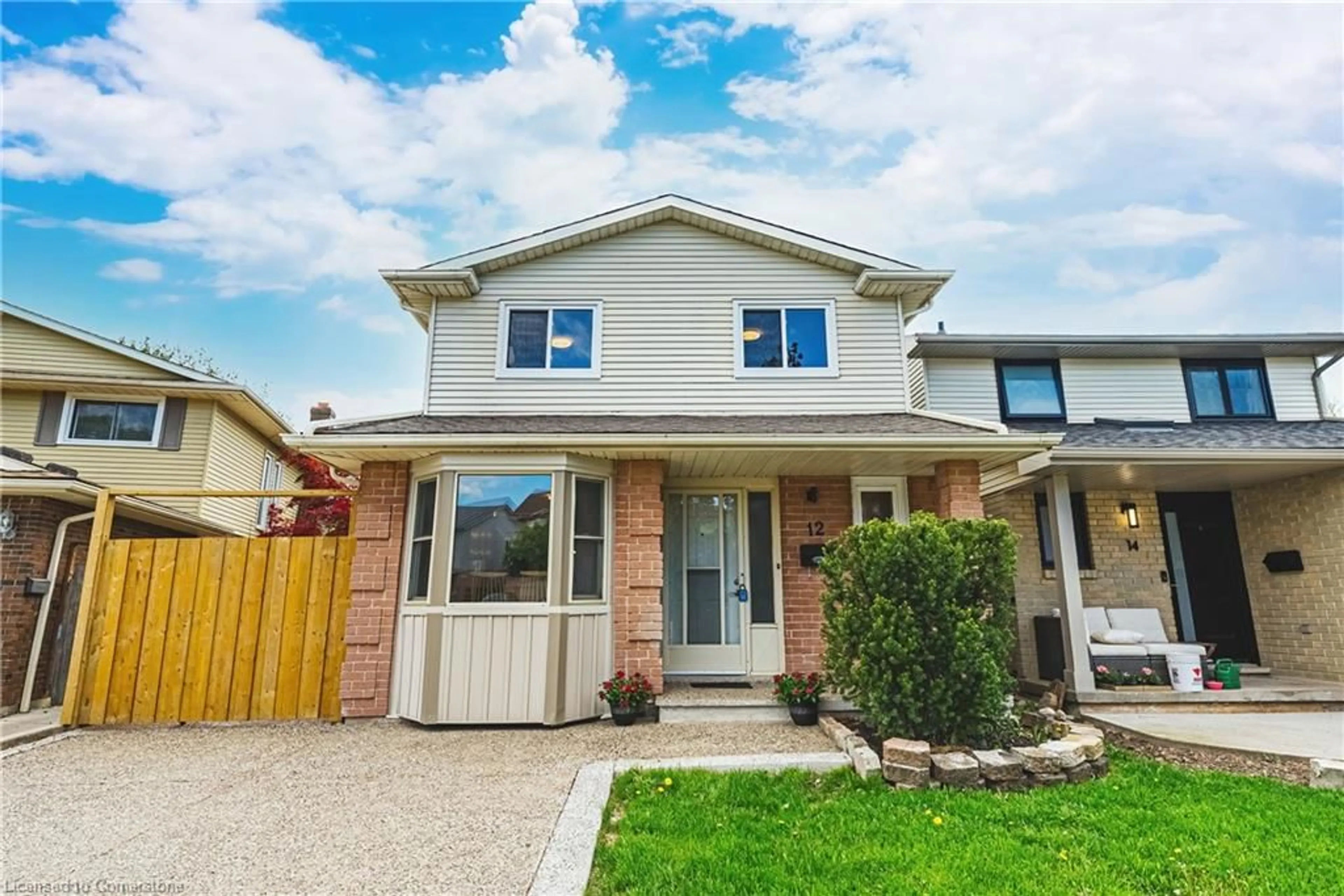 Frontside or backside of a home, the fenced backyard for 12 Naples Crt, Thorold Ontario L2V 4S7