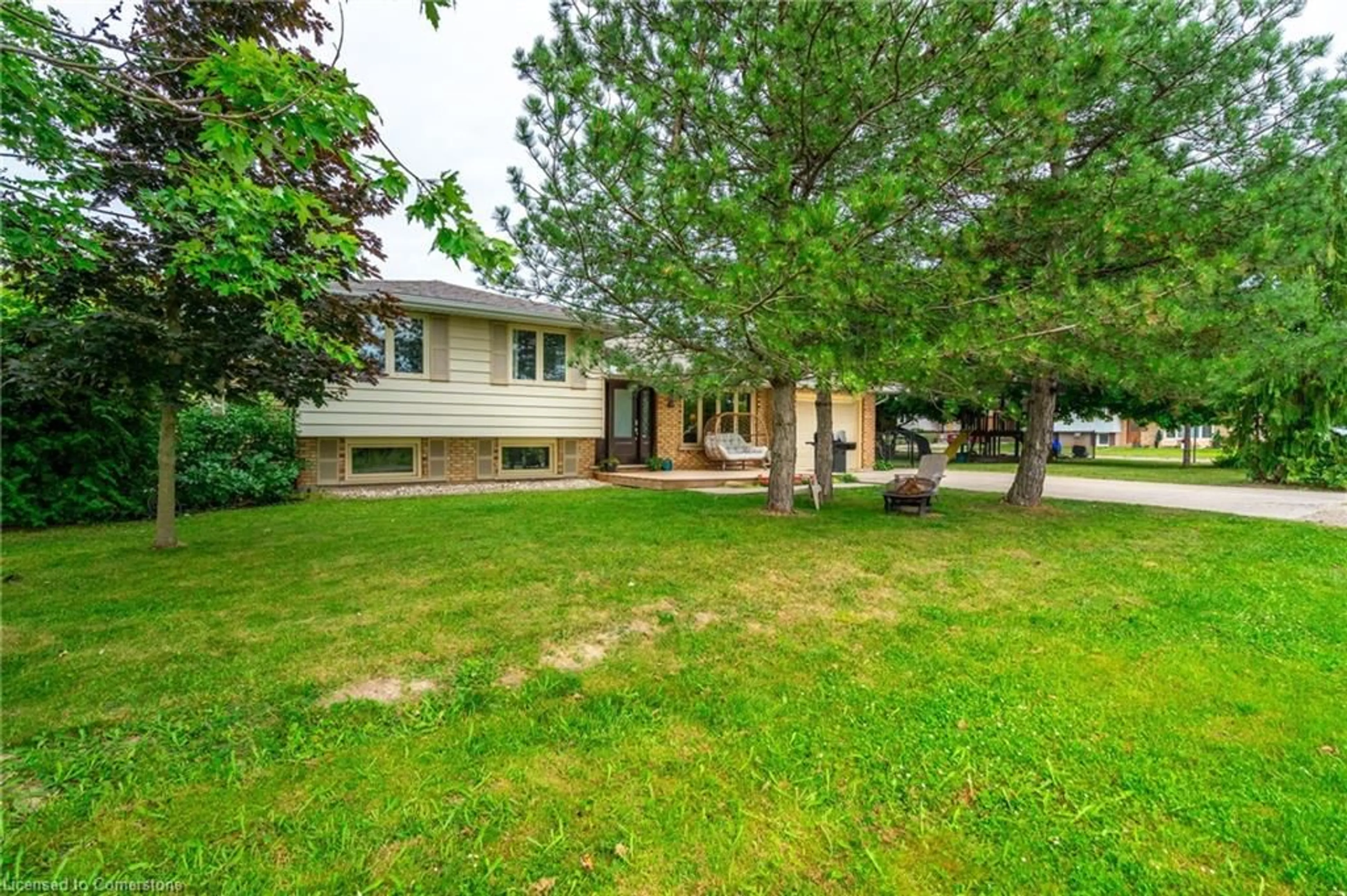 Frontside or backside of a home, the fenced backyard for 40 Wardell Cres, Hagersville Ontario N0A 1H0