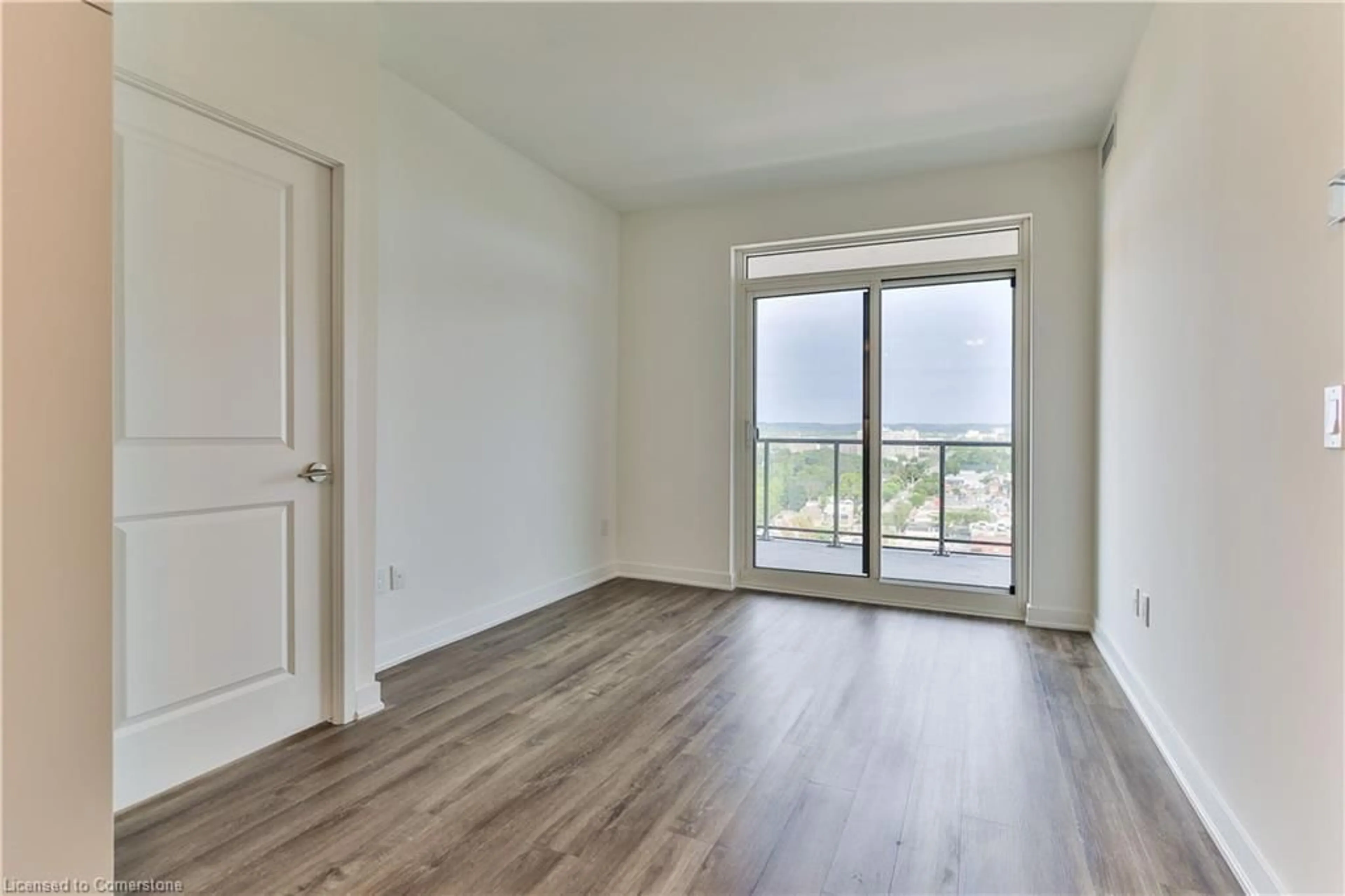 A pic of a room, wood floors for 2007 James St #1401, Burlington Ontario L7R 0G7