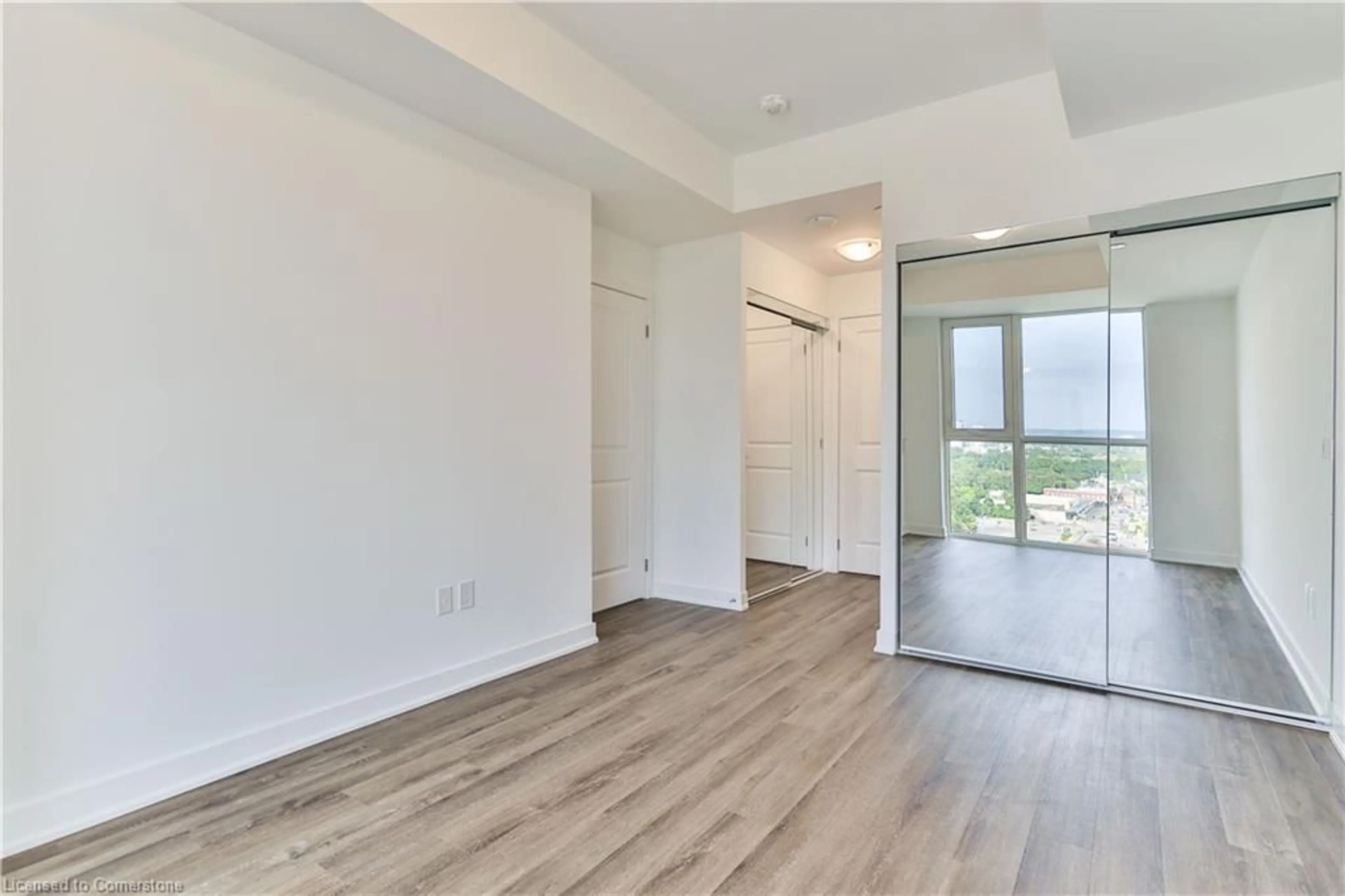 A pic of a room, wood floors for 2007 James St #1401, Burlington Ontario L7R 0G7