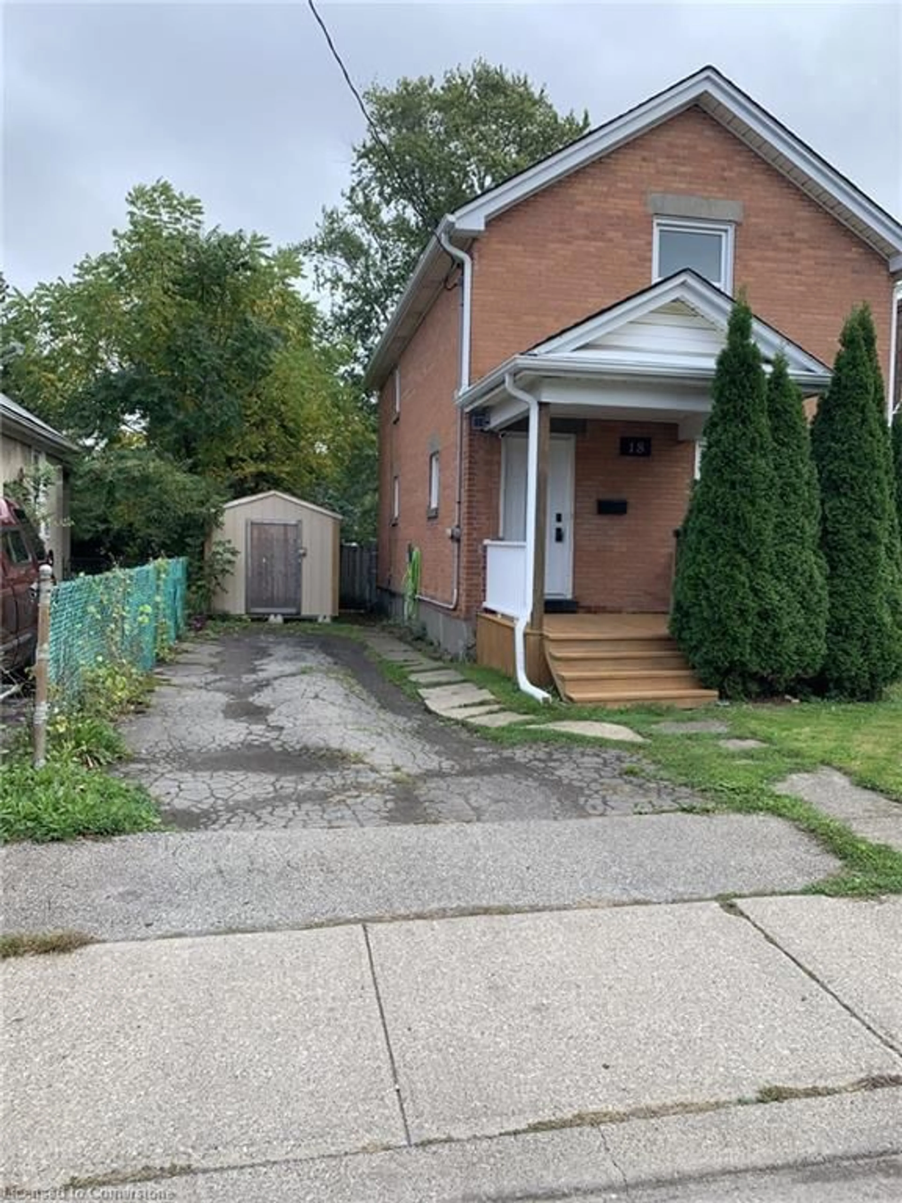 Frontside or backside of a home, the street view for 18 Prince St, St. Catharines Ontario L2R 3X7