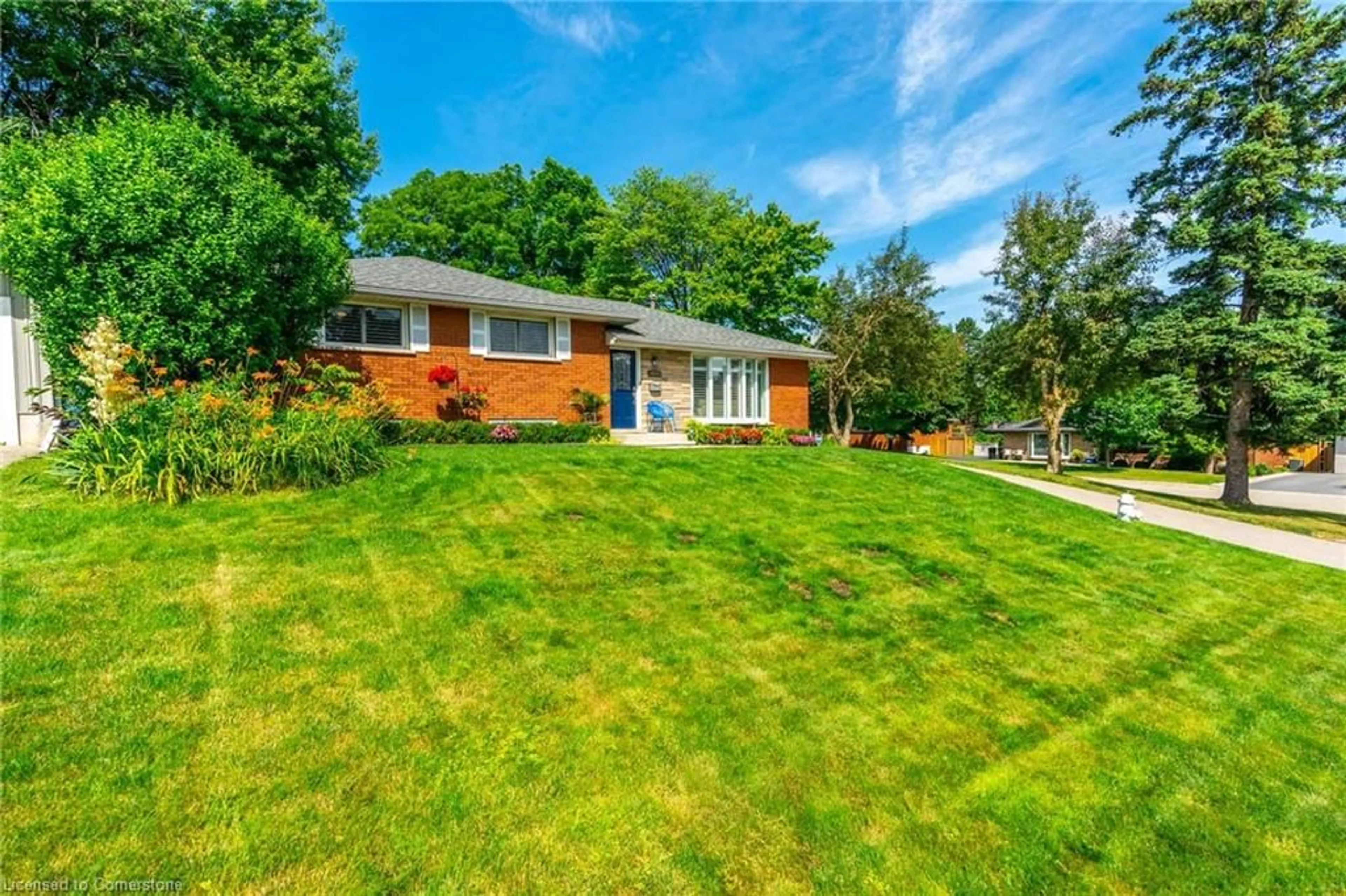 Frontside or backside of a home, the fenced backyard for 266 Alma Lane, Ancaster Ontario L9G 2T5