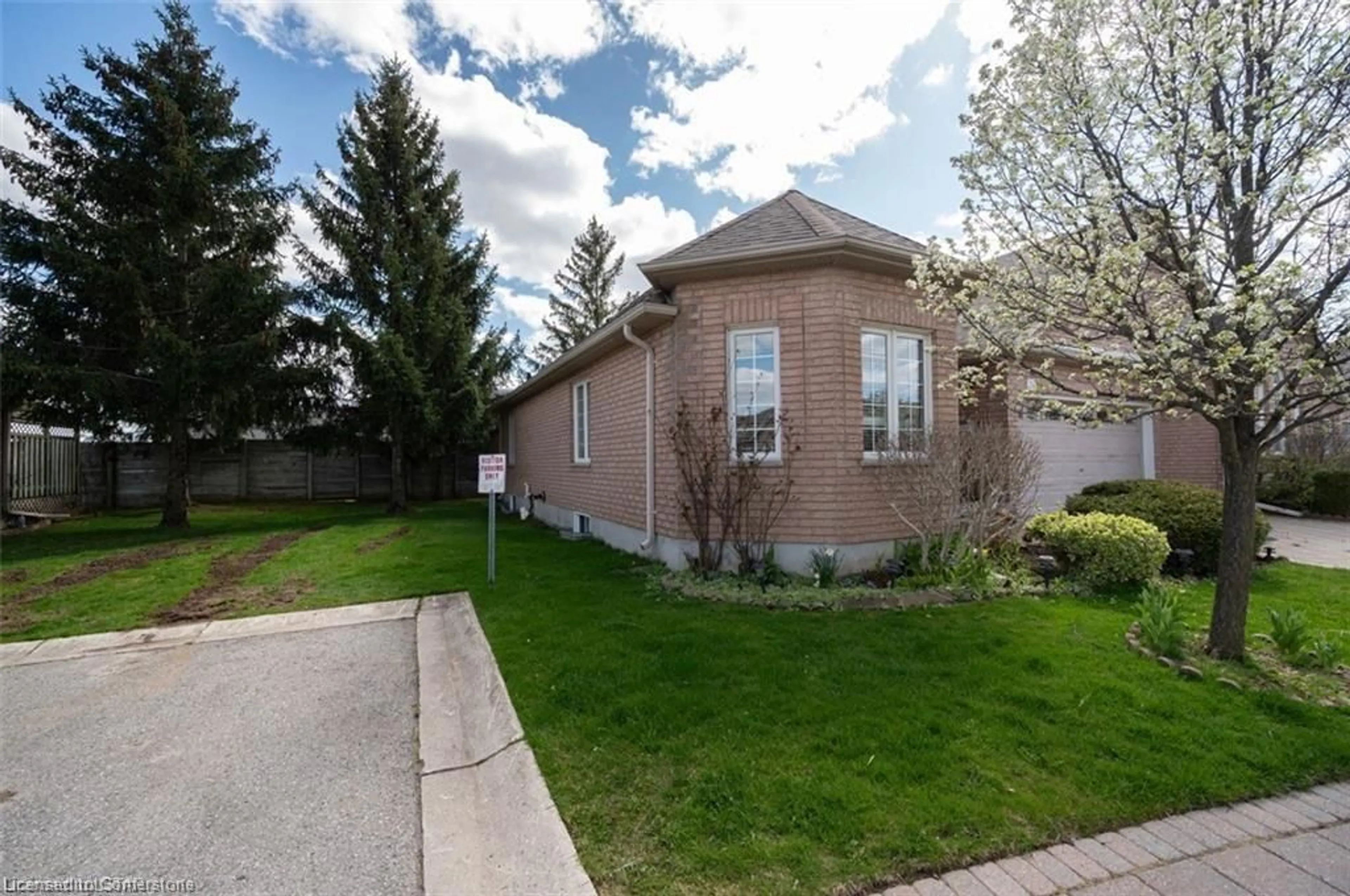 Frontside or backside of a home, the fenced backyard for 638 Wharncliffe Rd #24, London Ontario N6J 2N4