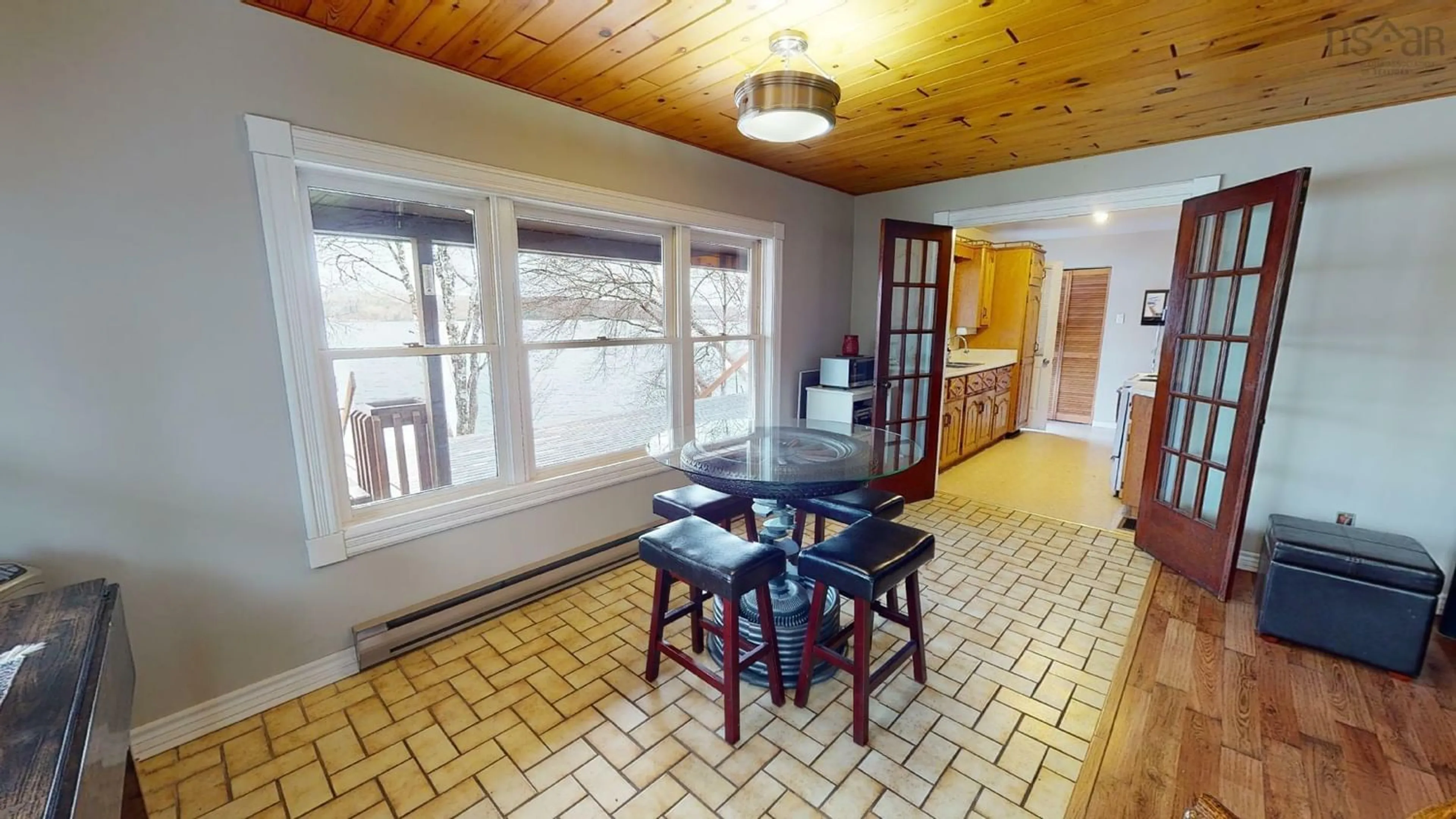 Dining room, wood floors, cottage for 13249 Highway 7, Aspen Nova Scotia B1H 1E0