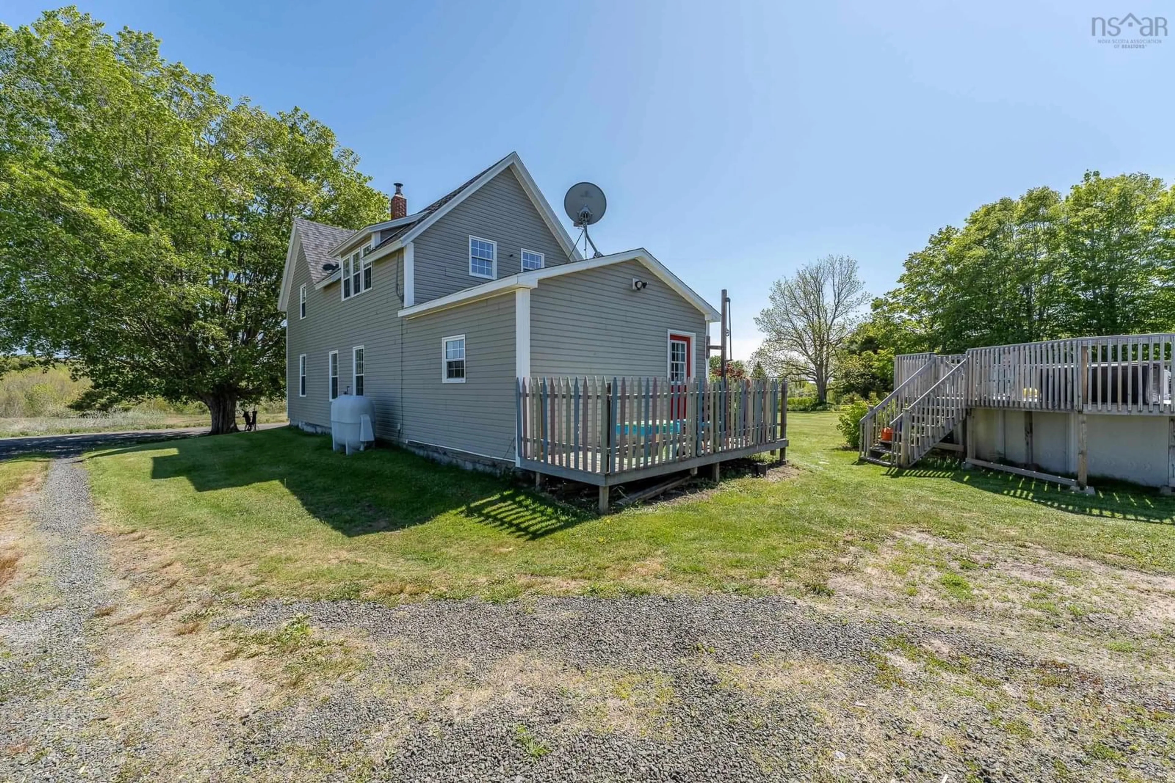 Frontside or backside of a home, the fenced backyard for 901 Doucetteville Road, Doucetteville Nova Scotia B0W 1H0