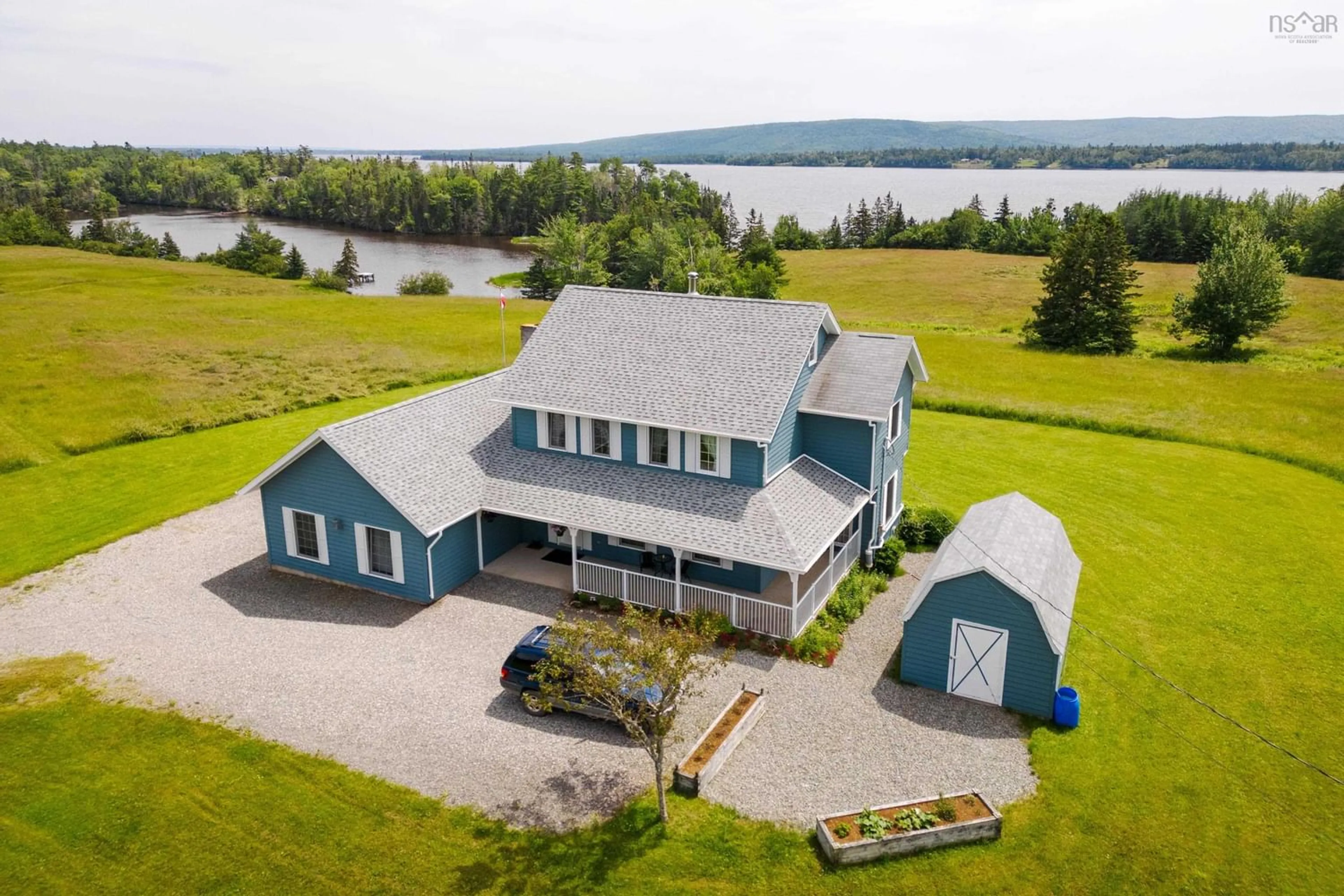 A pic from outside/outdoor area/front of a property/back of a property/a pic from drone, water/lake/river/ocean view for 632 Orangedale Iona Rd, West Alba Nova Scotia B0E 3M0