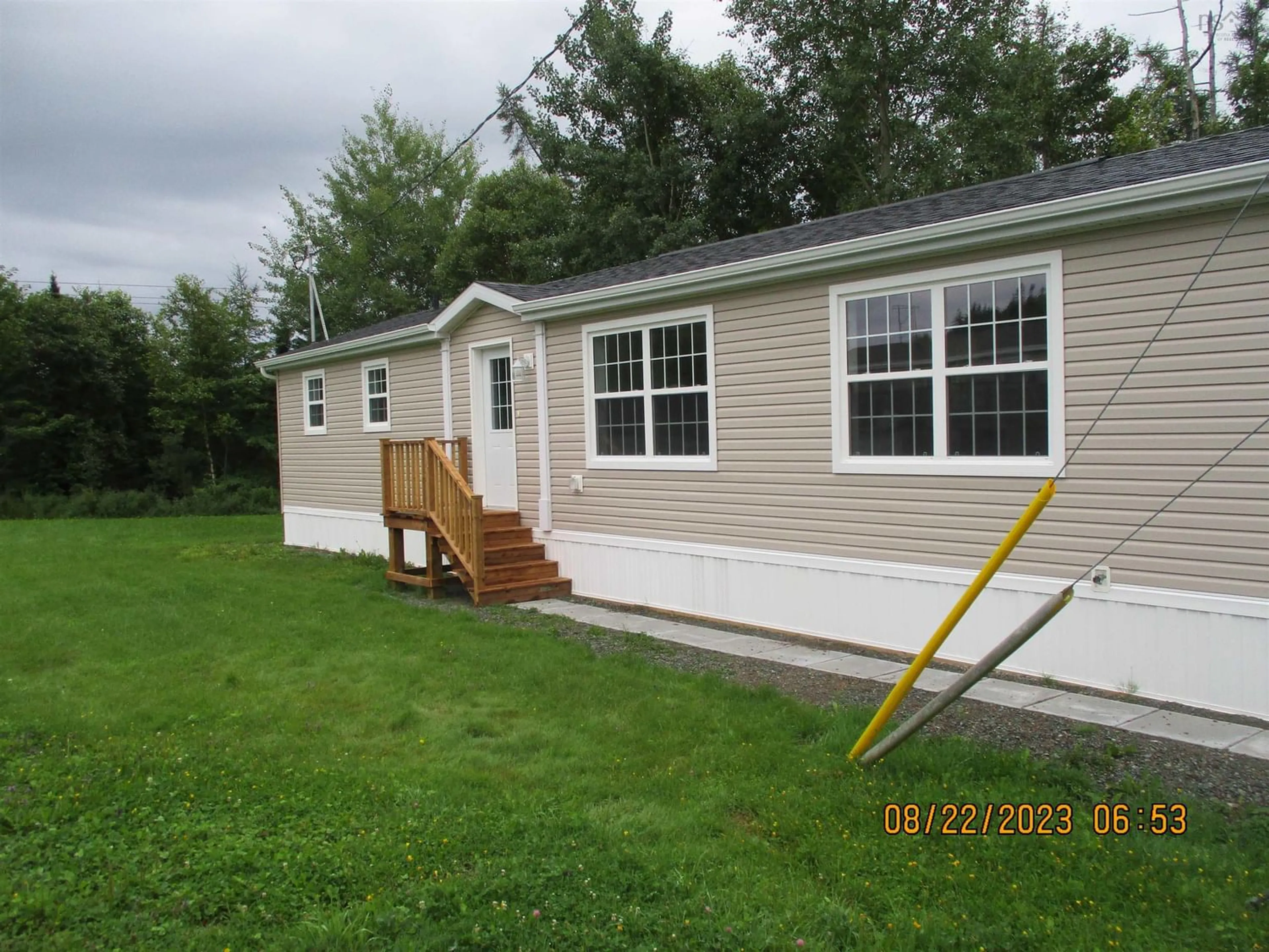 Home with vinyl exterior material for 2 Trainor Dr, Port Hawkesbury Nova Scotia B9N 3N8