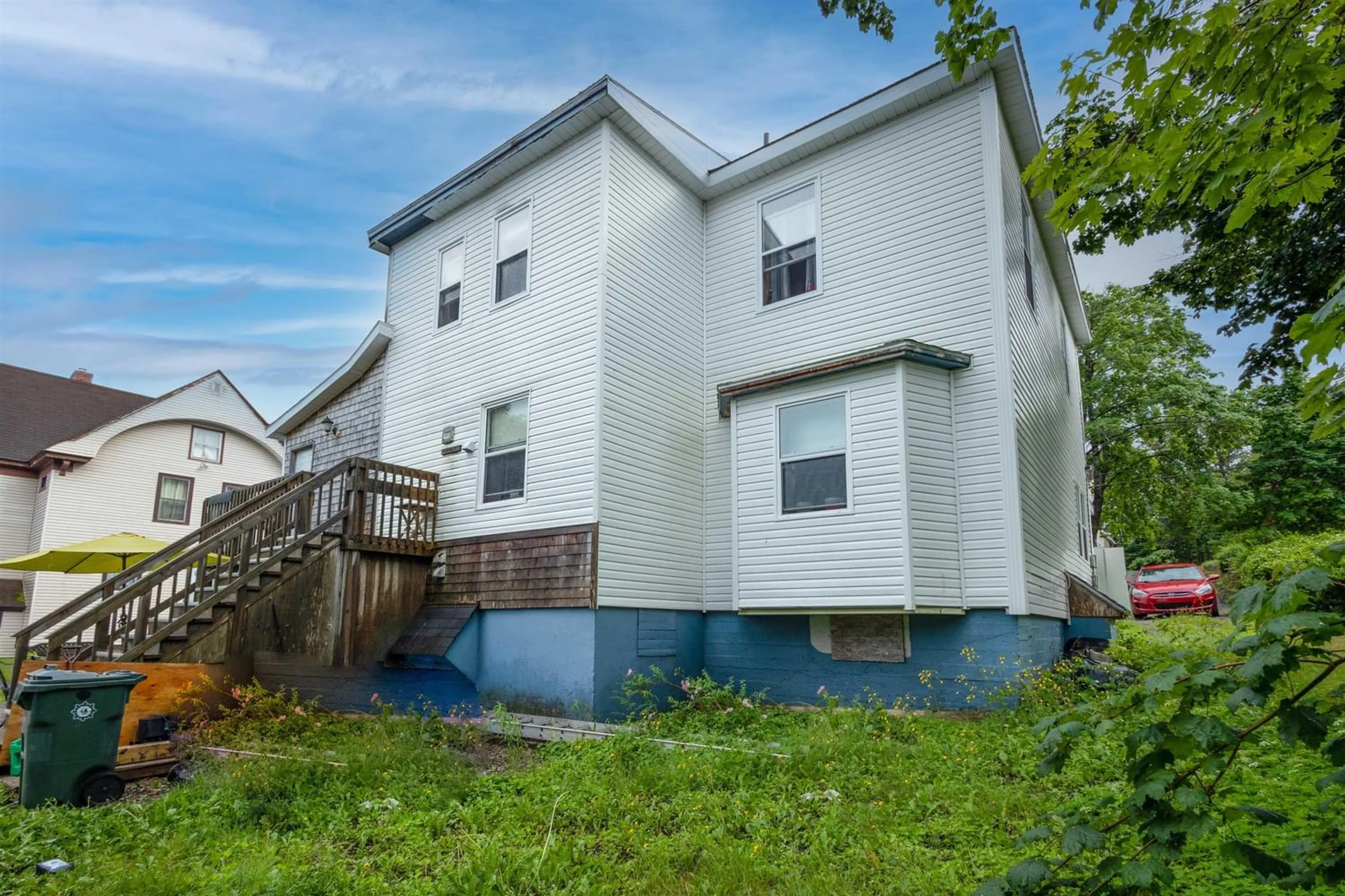 A pic from exterior of the house or condo, the fenced backyard for 7 View St, North Sydney Nova Scotia B2A 1E9