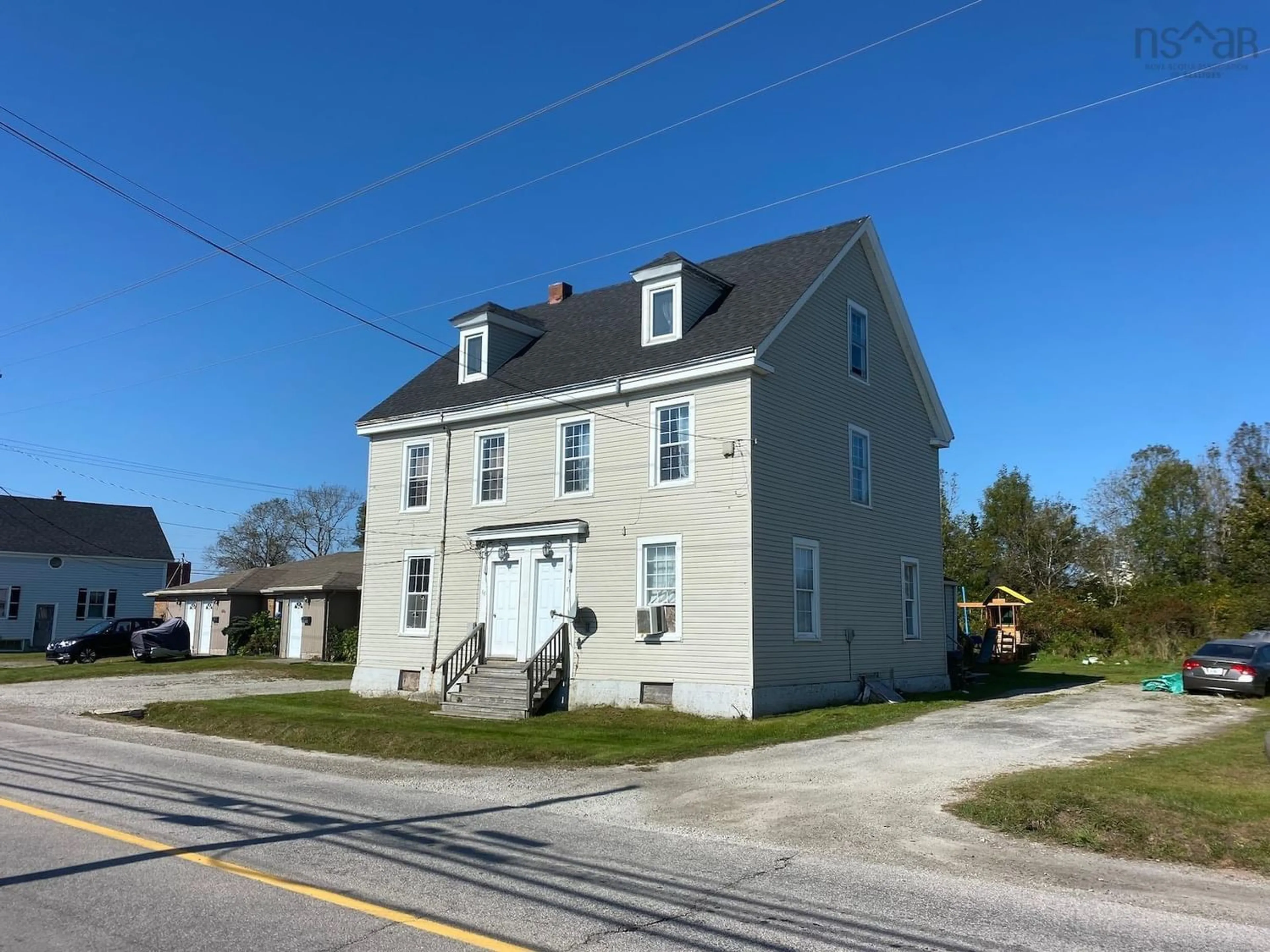 Frontside or backside of a home, the front or back of building for 68 Parade St, Yarmouth Nova Scotia B5A 3B4