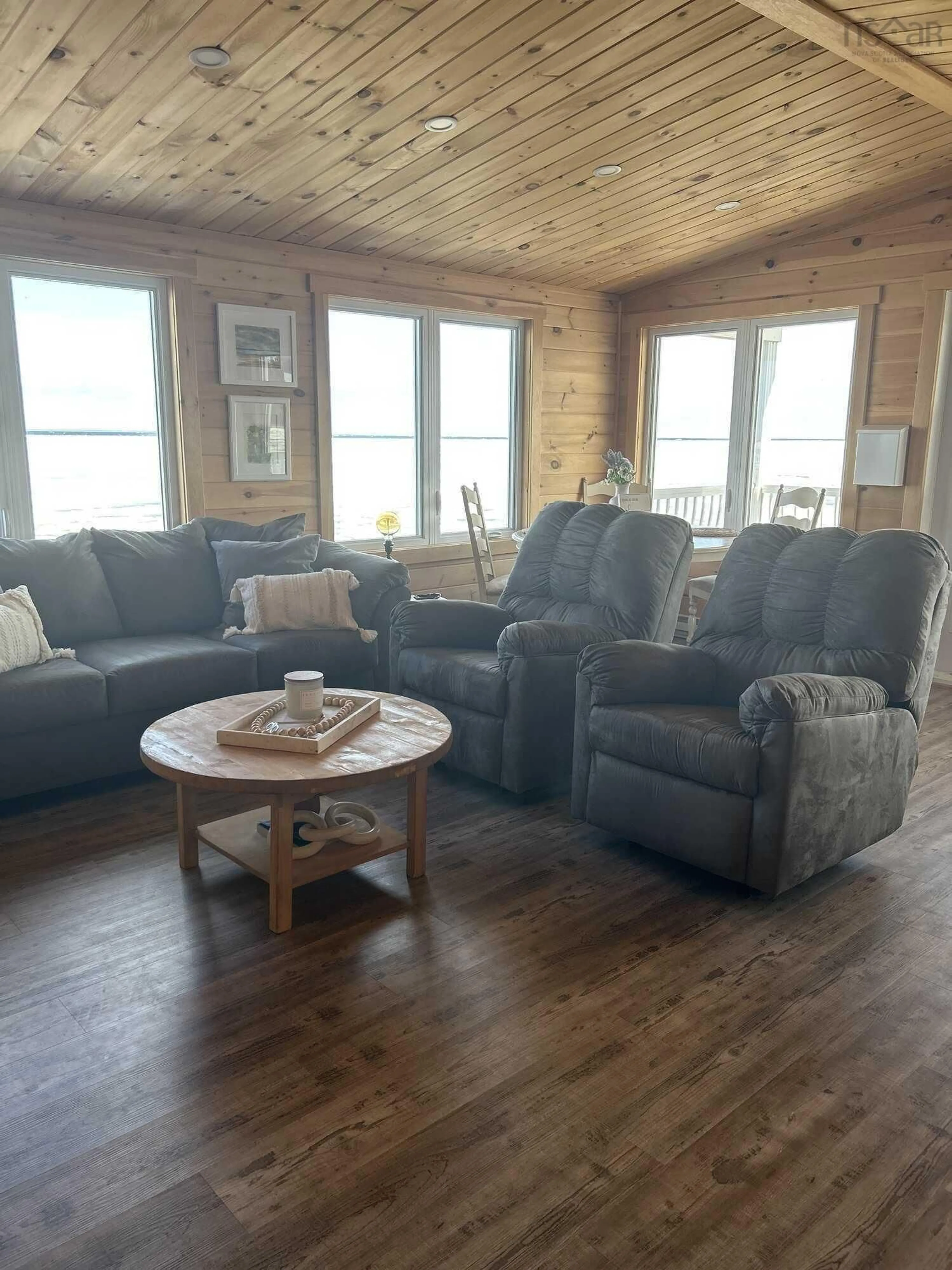 Living room with furniture, wood/laminate floor for 565 Caribou Island Rd, Caribou Island Nova Scotia B0K 1H0