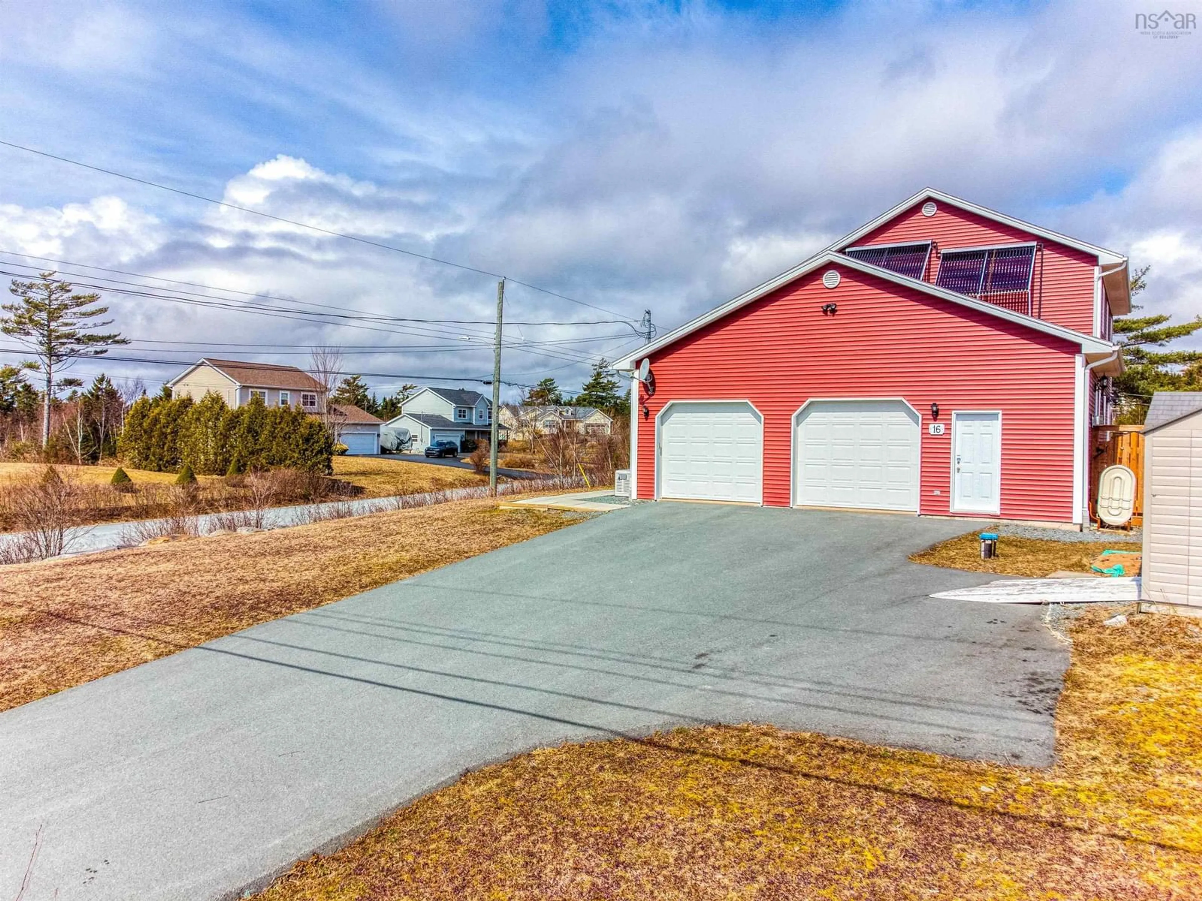 Frontside or backside of a home, the street view for 16 Morgan Dr, Lawrencetown Nova Scotia B2Z 1V6