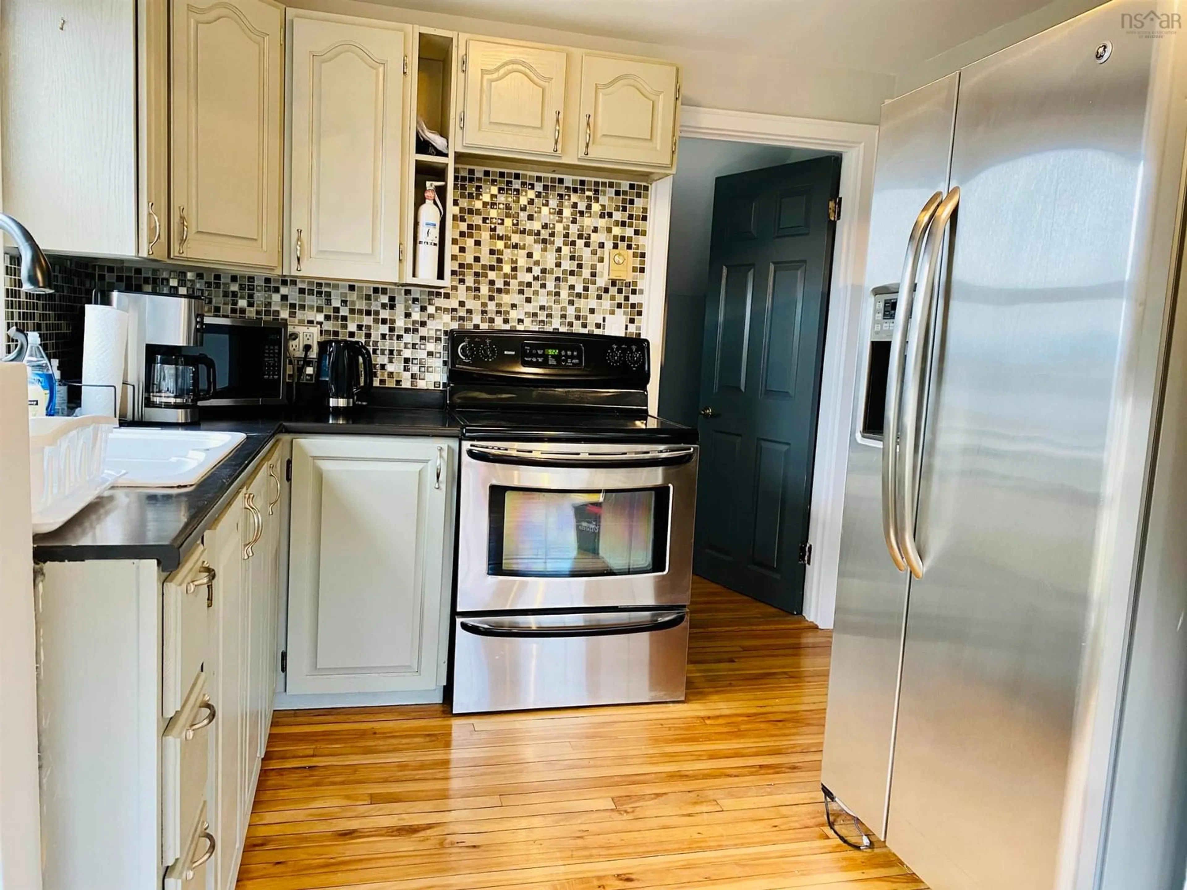 Standard kitchen, wood floors, cottage for 170 Ochterloney St, Dartmouth Nova Scotia B2Y 1E1