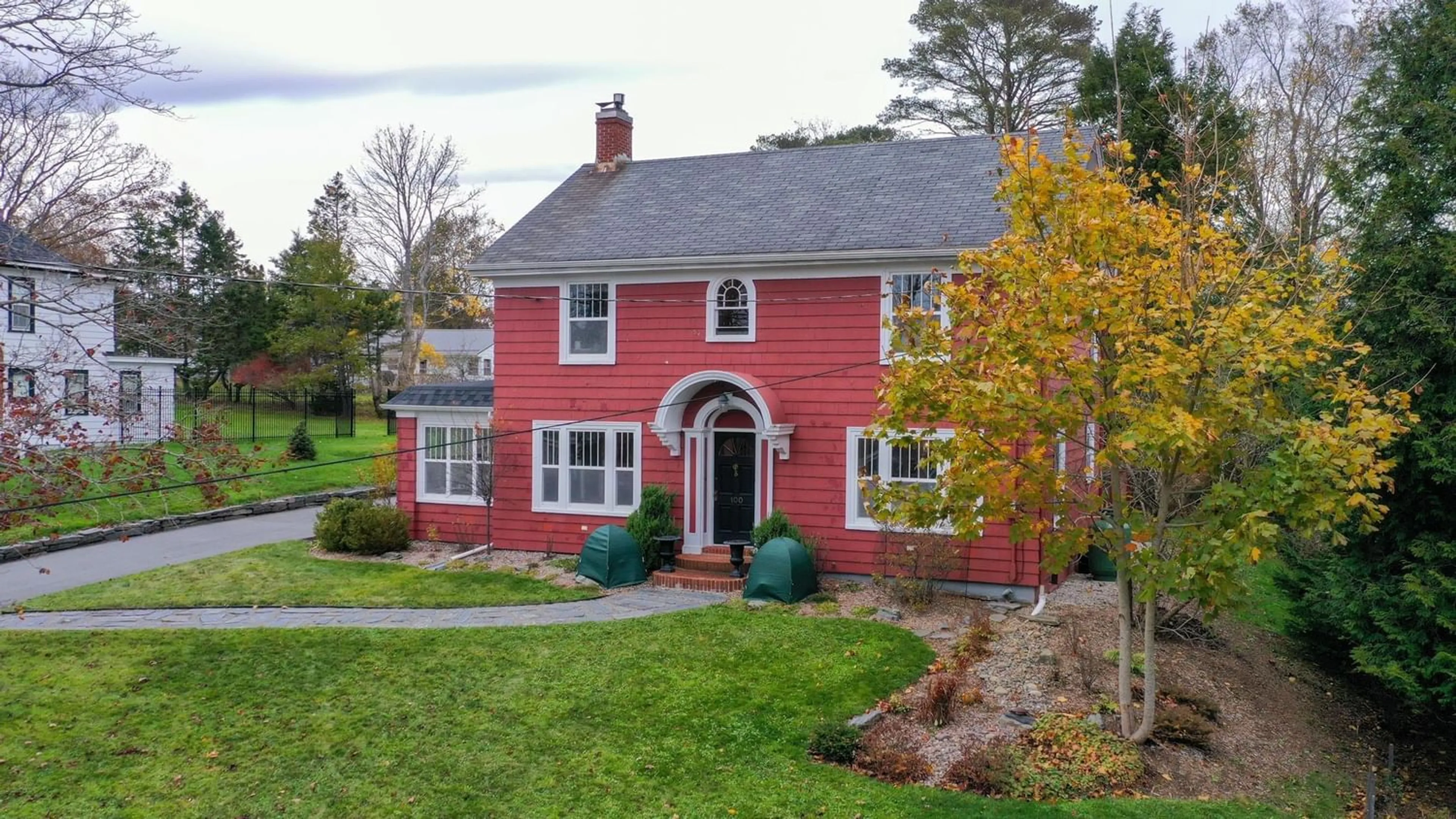 Home with brick exterior material for 100 Green St, Lunenburg Nova Scotia B0J 2C0