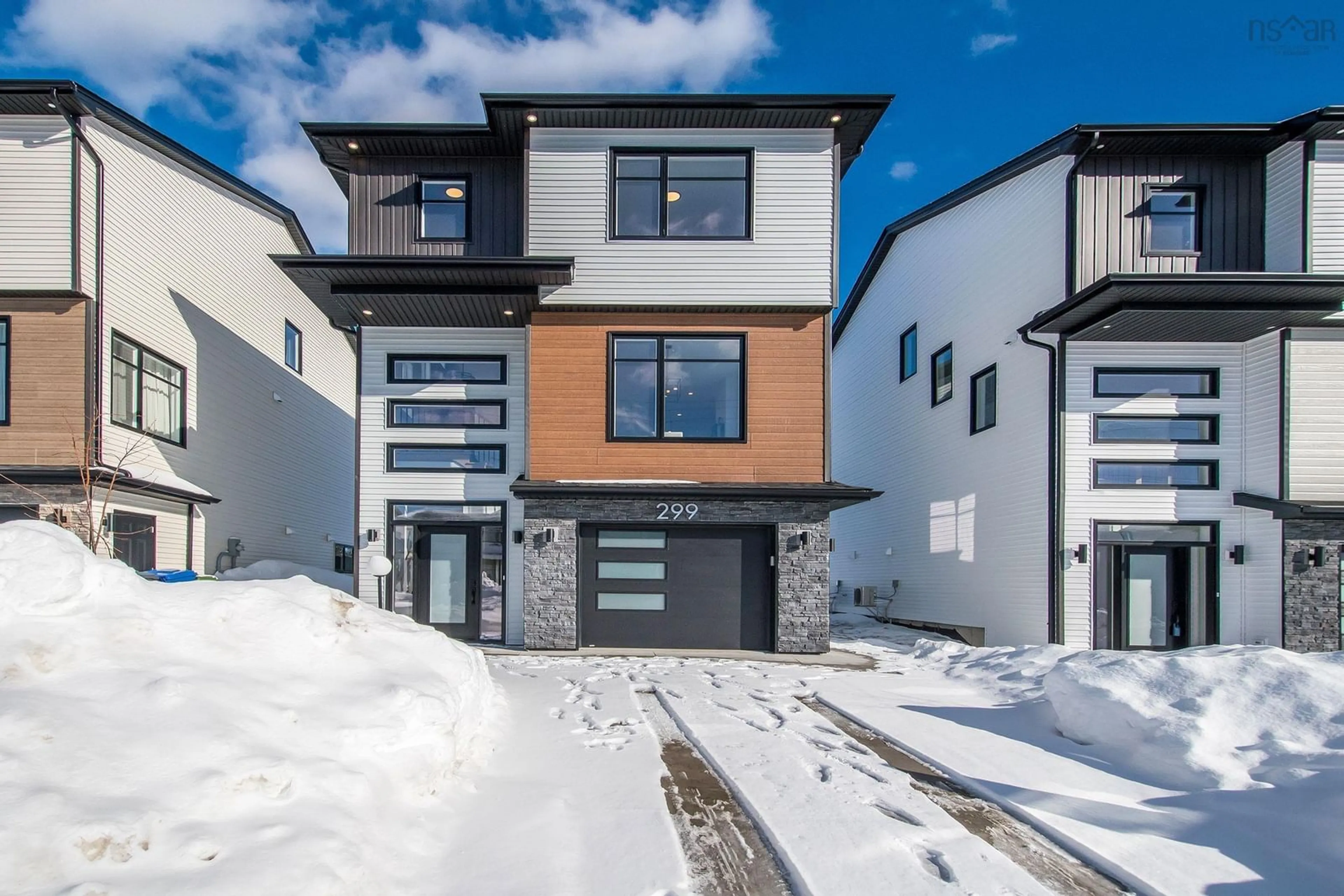 Home with stucco exterior material for 299 Marketway Lane, Timberlea Nova Scotia B3T 0K9
