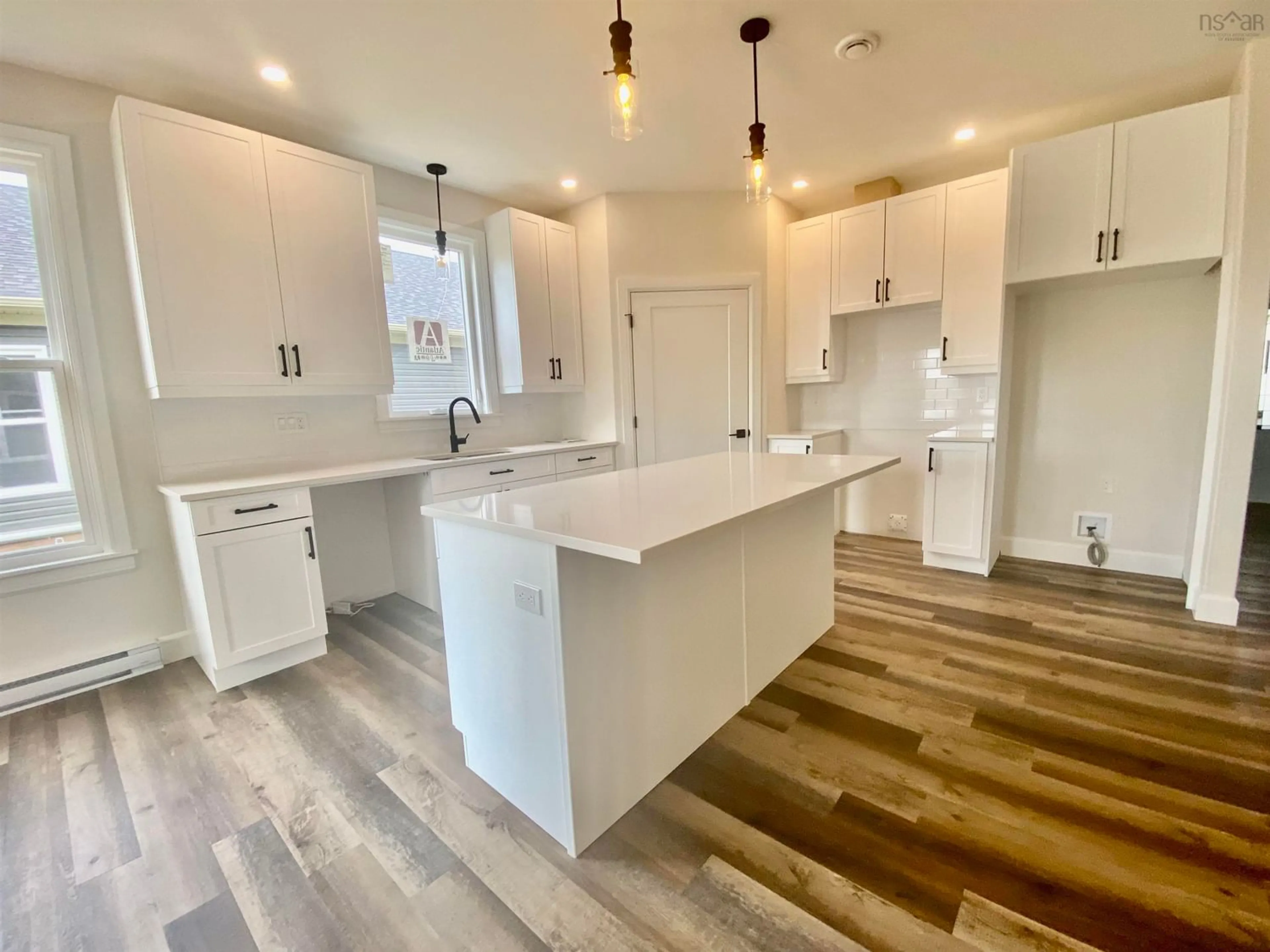 Open concept kitchen for 16 Thistle St, Falmouth Nova Scotia B0P 1L0