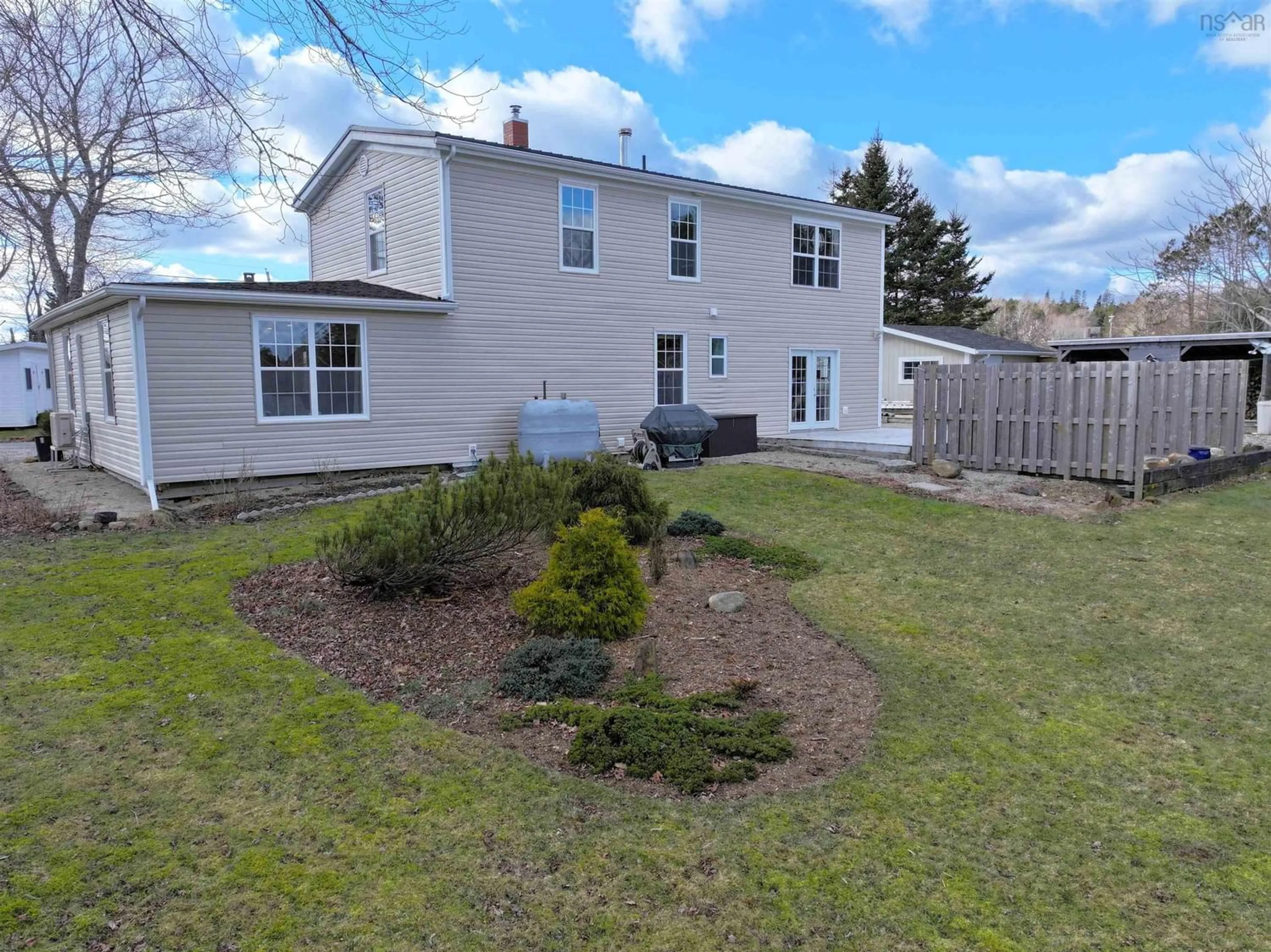 Frontside or backside of a home, the fenced backyard for 39 Smith Rd, Chester Nova Scotia B0J 1J0