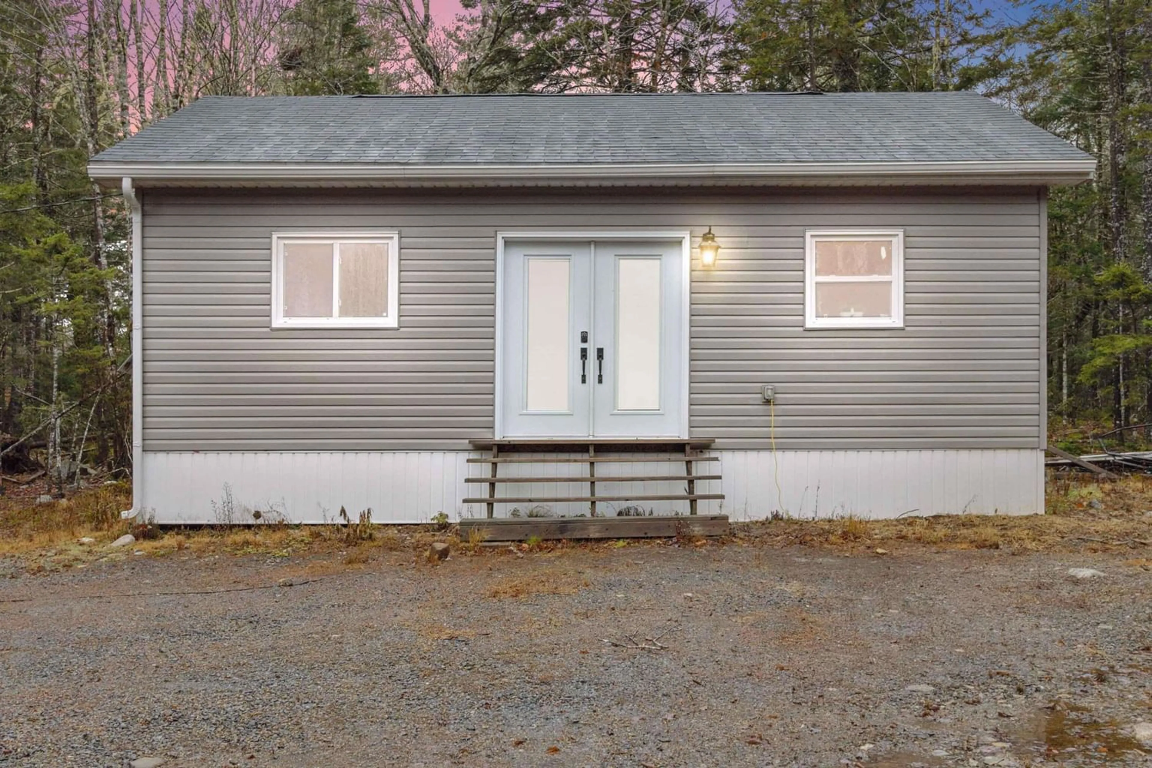 Home with vinyl exterior material for 66 Shore Rd, Walden Nova Scotia B0J 2E0