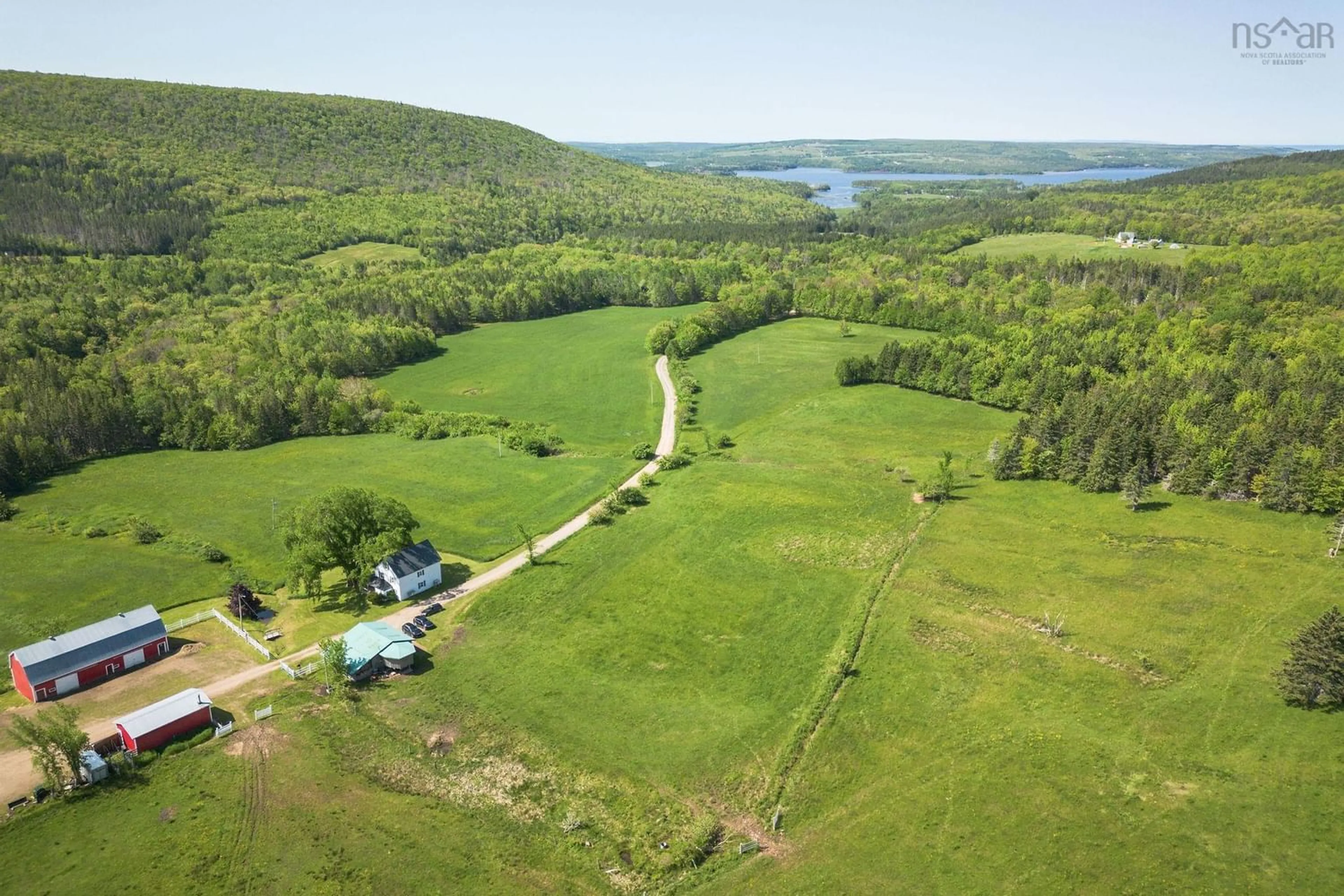 A pic from outside/outdoor area/front of a property/back of a property/a pic from drone, water/lake/river/ocean view for 380 Northeast Mabou Rd, Mabou Nova Scotia B0E 1X0