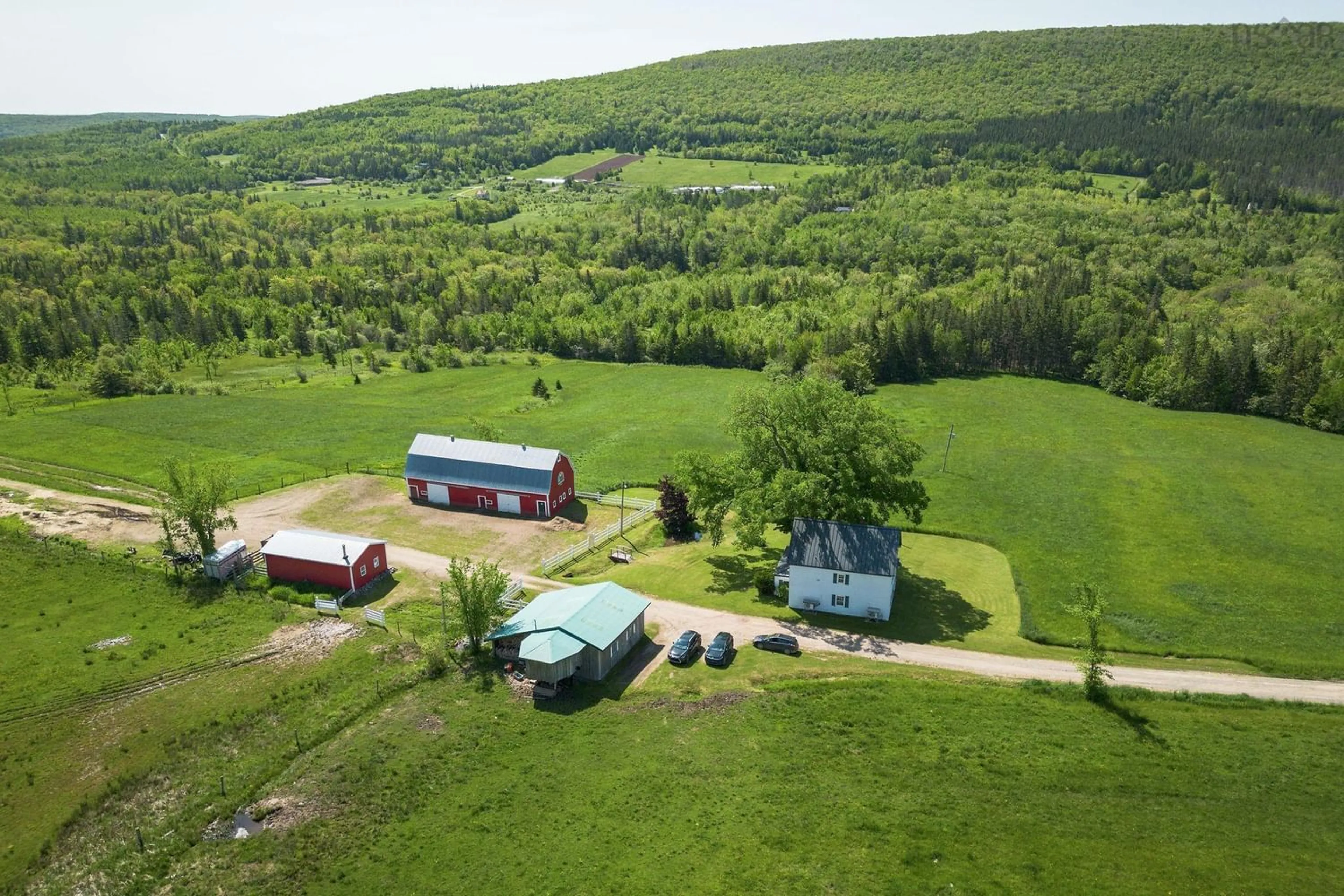 A pic from outside/outdoor area/front of a property/back of a property/a pic from drone, mountain view for 380 Northeast Mabou Rd, Mabou Nova Scotia B0E 1X0