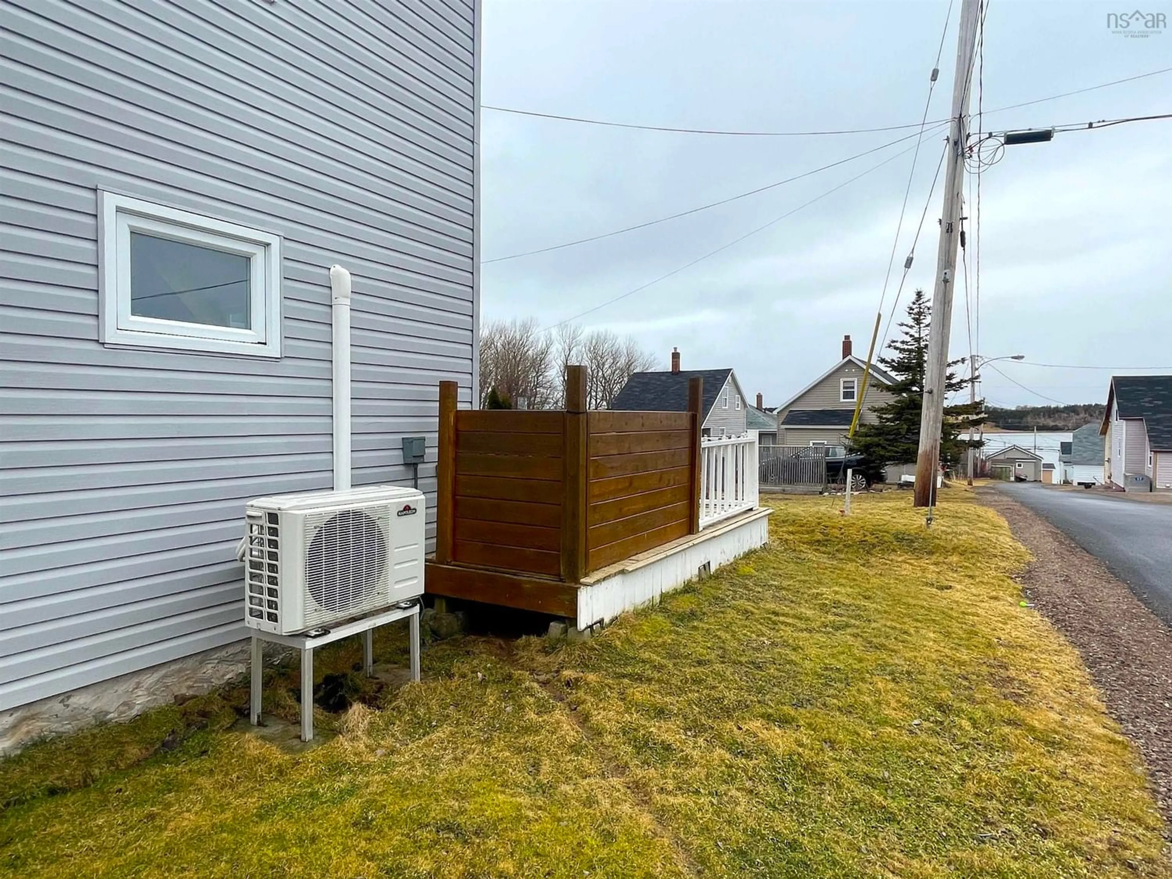 A pic from exterior of the house or condo, the fenced backyard for 27 Chemin Shomphe Rd, Chéticamp Nova Scotia B0E 1H0