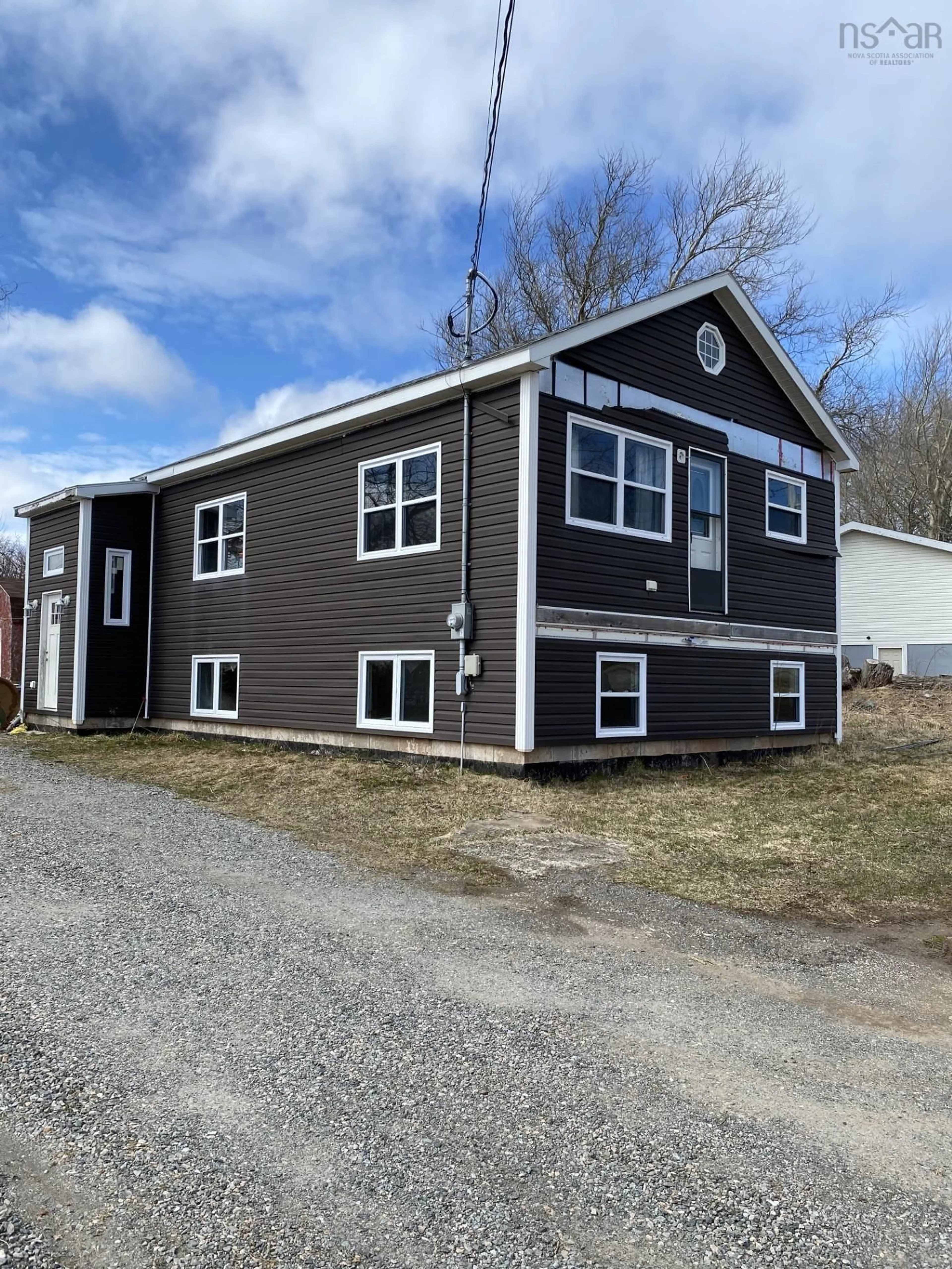Home with vinyl exterior material for 84 Church Rd, Little Bras D'Or Nova Scotia B1Y 2Y2