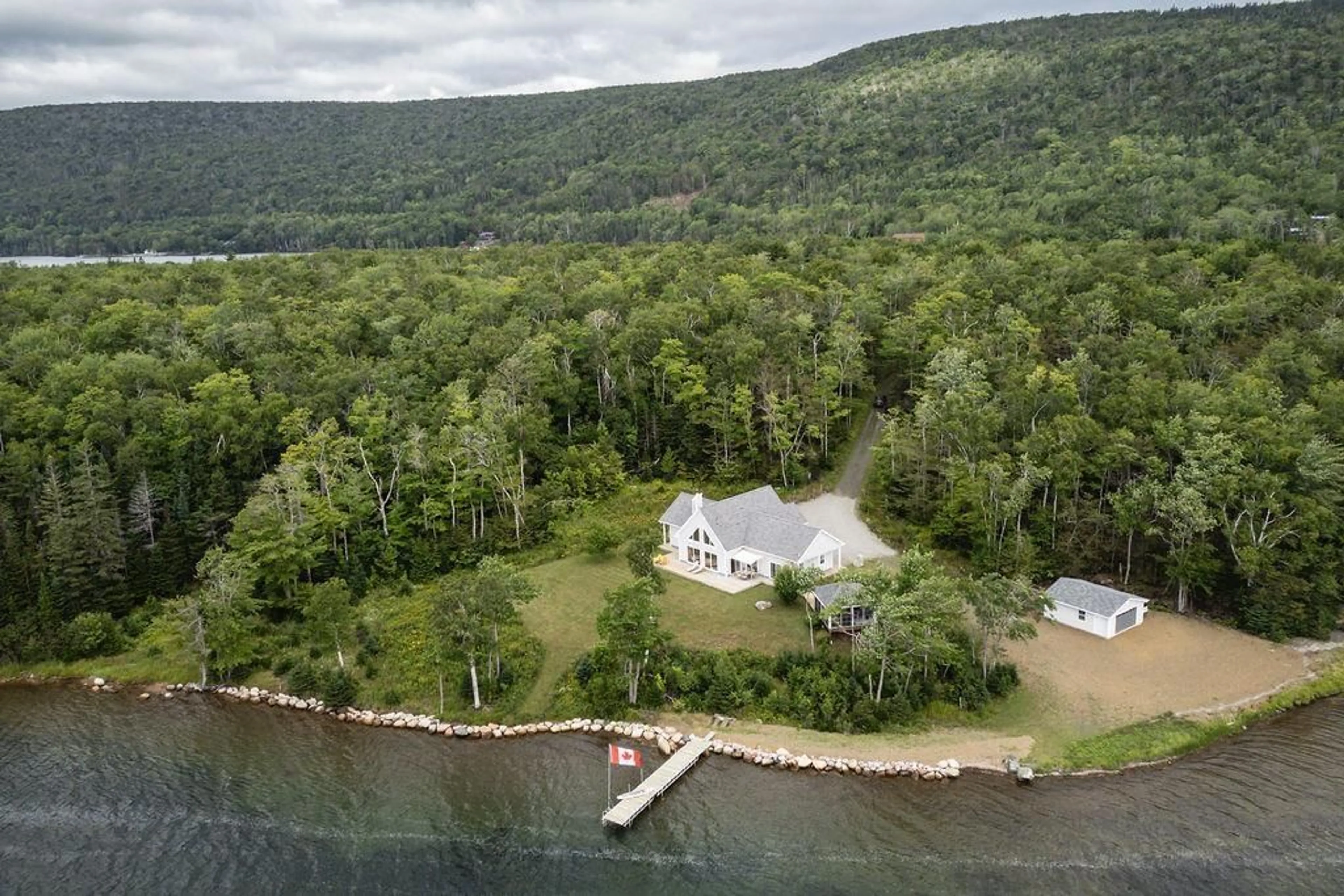 A pic from outside/outdoor area/front of a property/back of a property/a pic from drone, water/lake/river/ocean view for 187 6012 Rd, Marble Mountain Nova Scotia B0E 2Y0