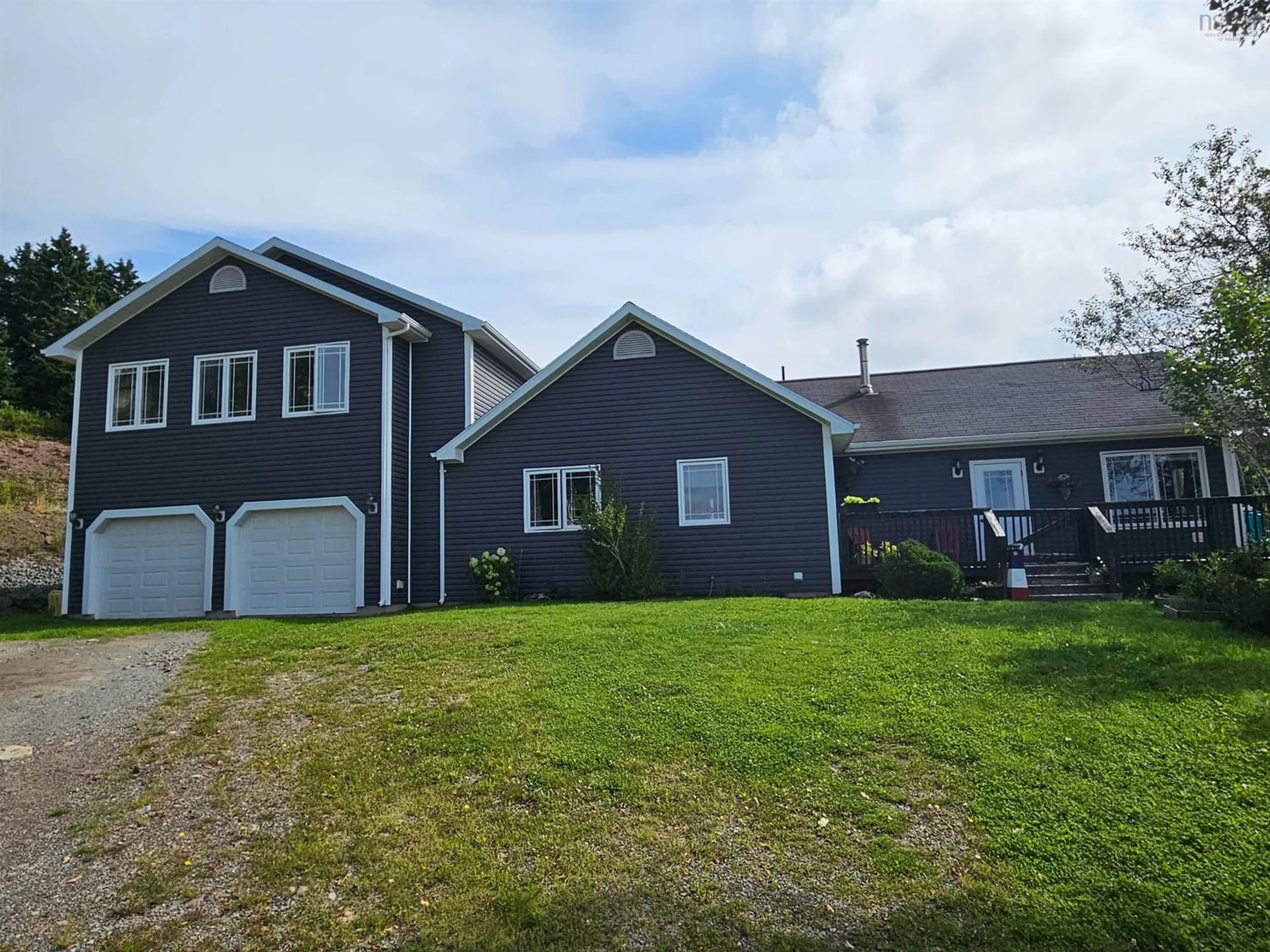 Frontside or backside of a home for 693 North Side River Bourgeois Rd, River Bourgeois Nova Scotia B0E 2X0