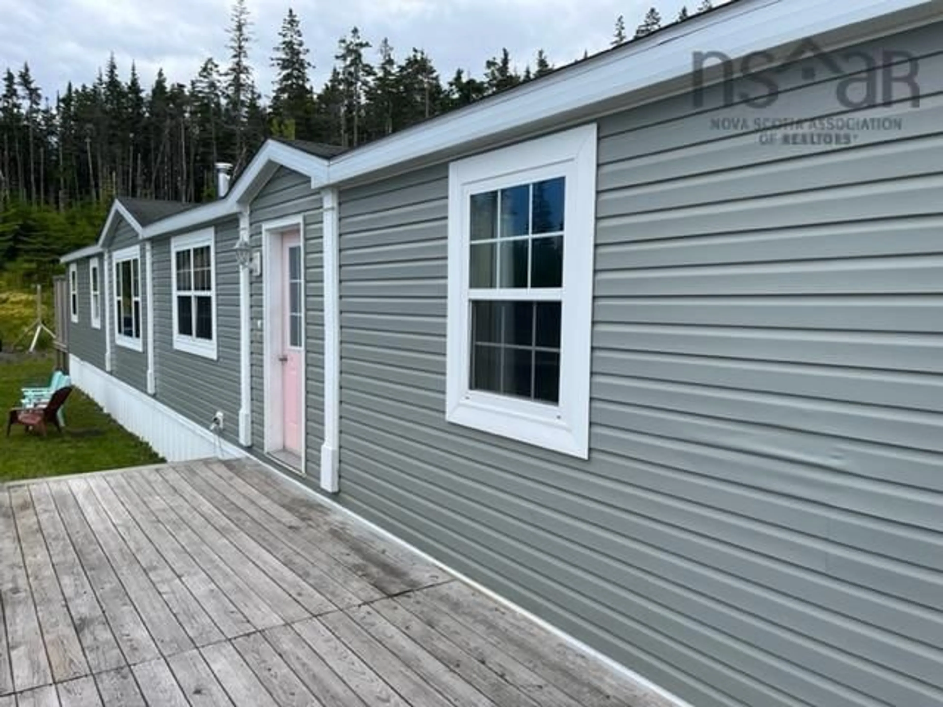 Home with vinyl exterior material for 10214 Grenville St, St. Peter's Nova Scotia B0E 3B0