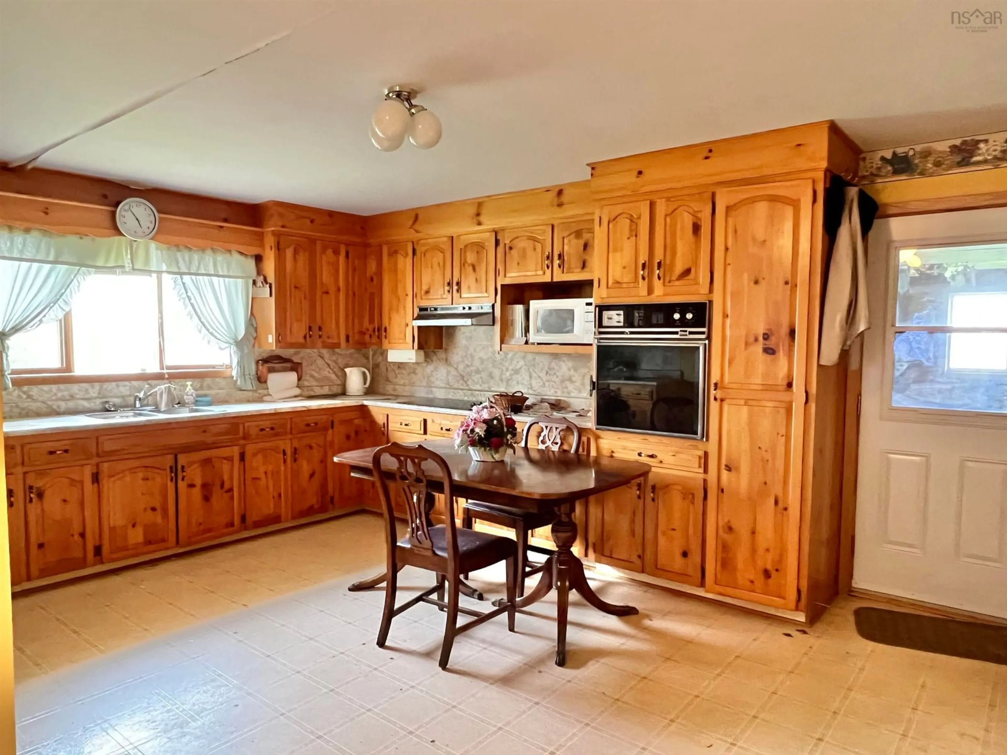 Kitchen, wood floors, cottage for 355 Pleasant St, Yarmouth Nova Scotia B5A 2K9