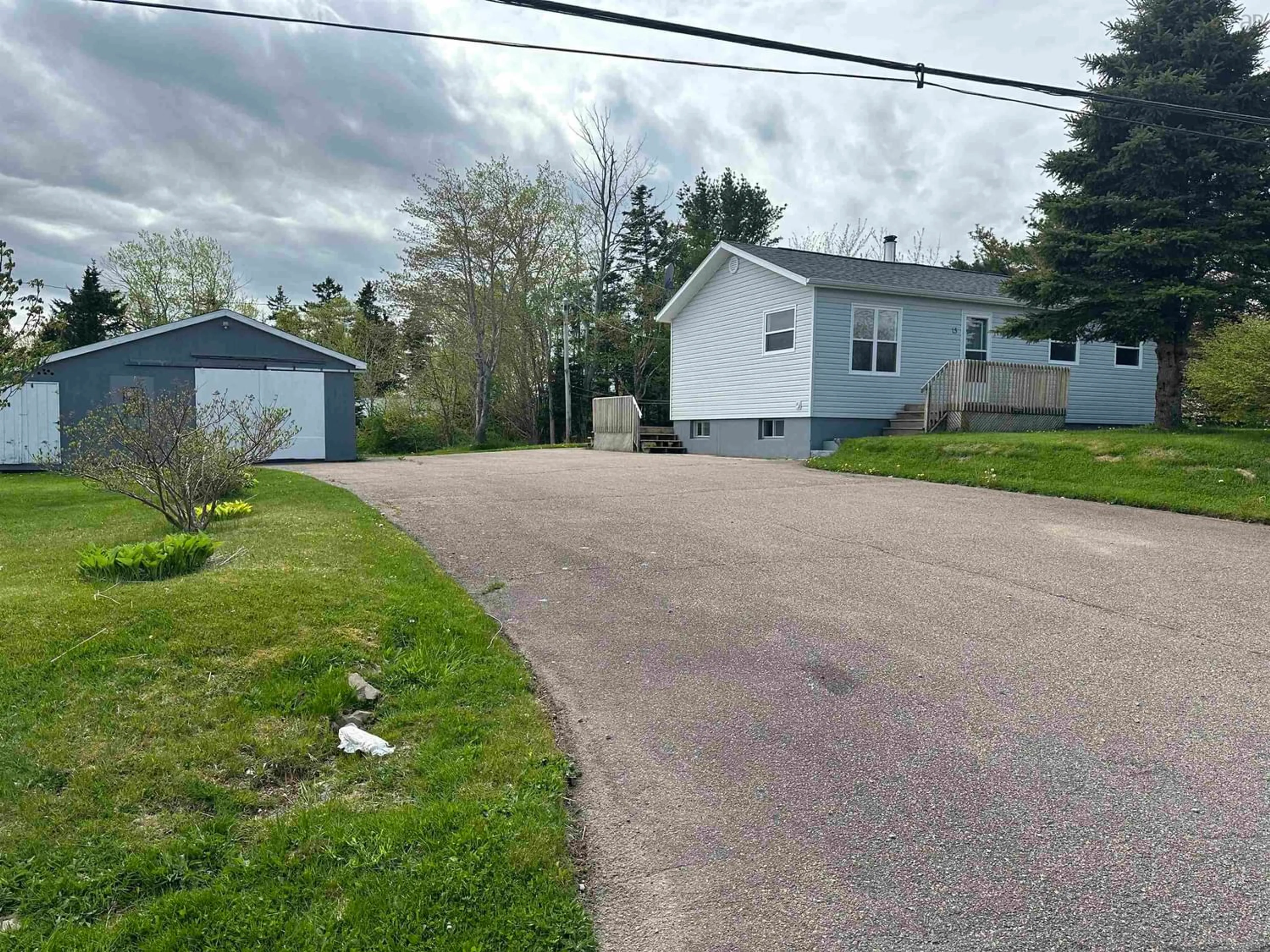 Frontside or backside of a home for 15 Cemetery Rd, Port Hastings Nova Scotia B9A 1K1