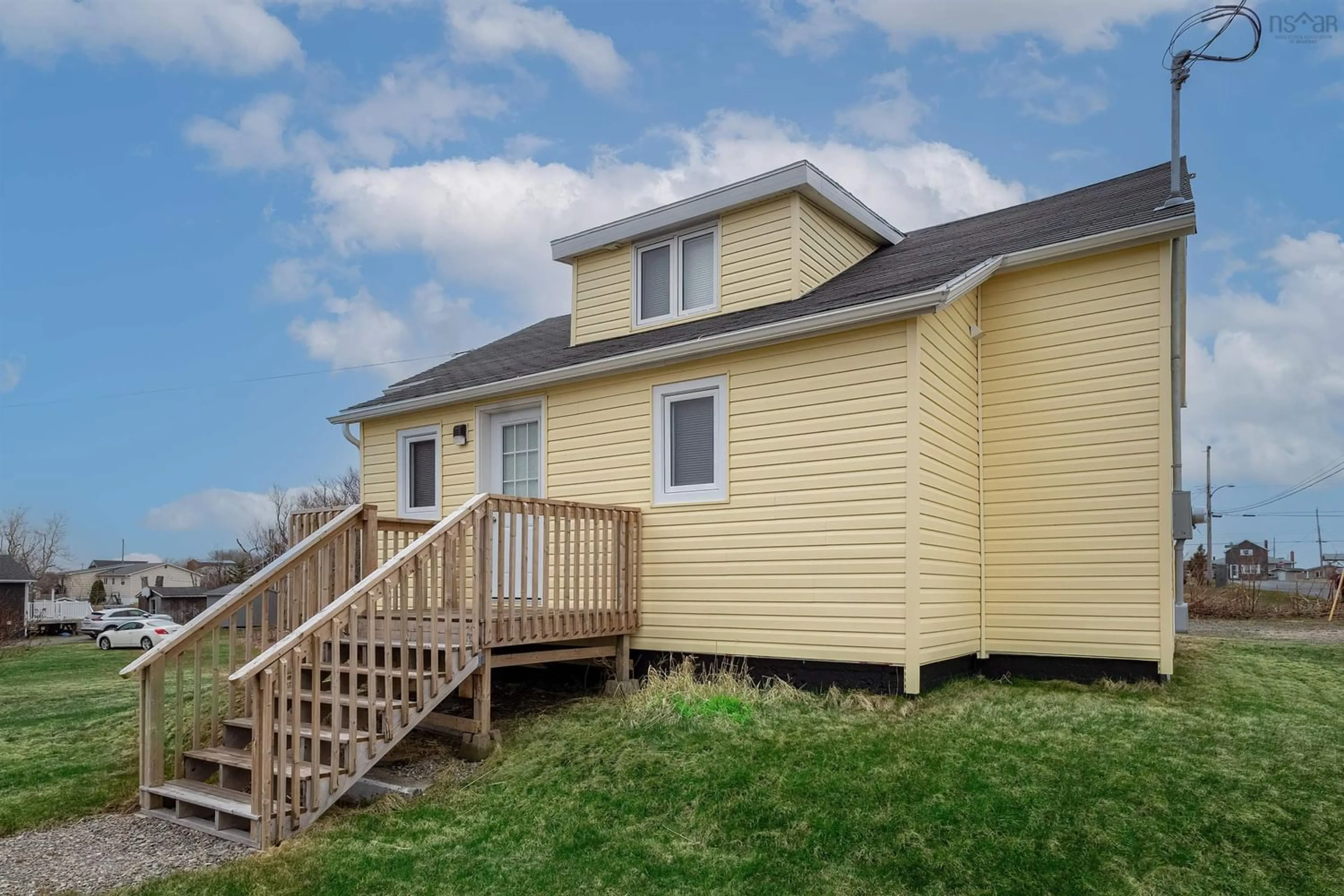 Frontside or backside of a home for 233 James Street, New Waterford Nova Scotia B1H 2X9
