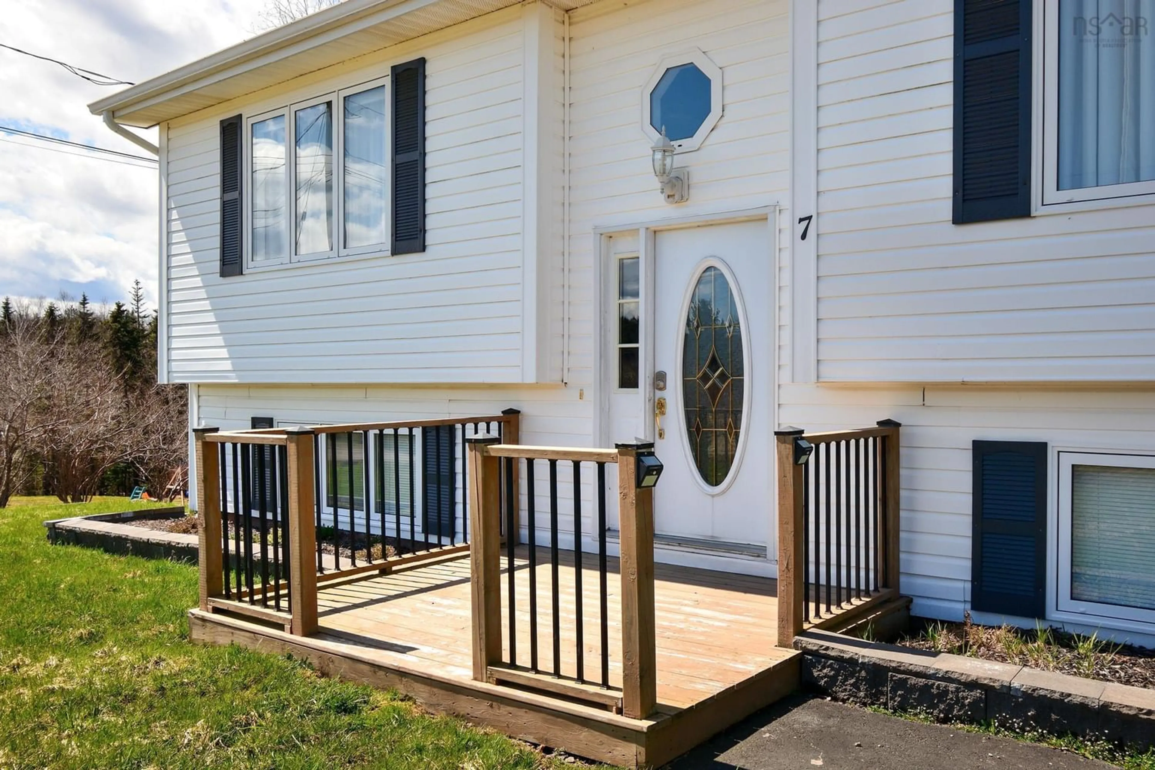 Home with vinyl exterior material, street for 7 Pine Ridge Dr, Port Hawkesbury Nova Scotia B9A 2L3