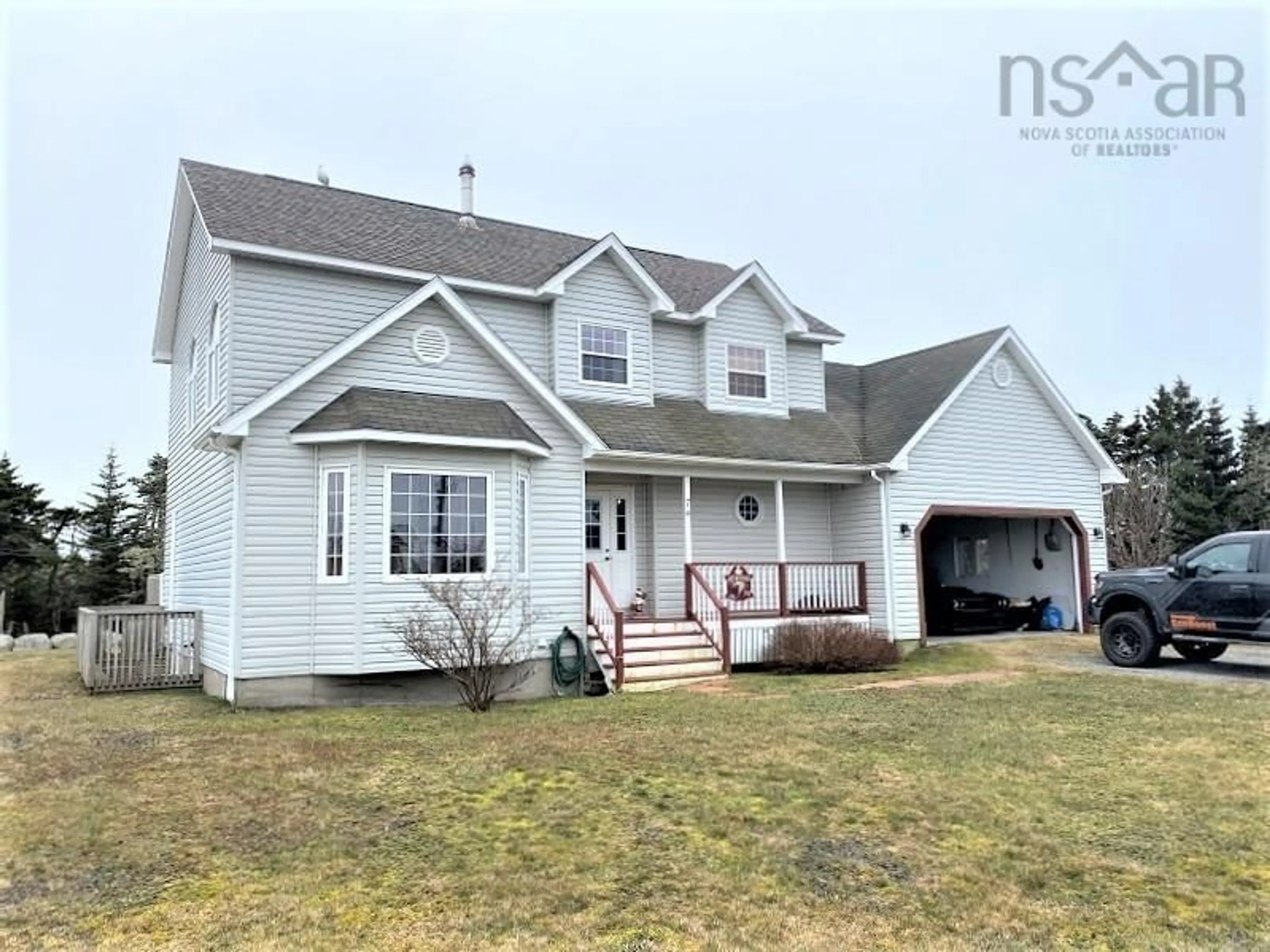 Frontside or backside of a home for 74 Woodland St, Clark's Harbour Nova Scotia B0W 1P0